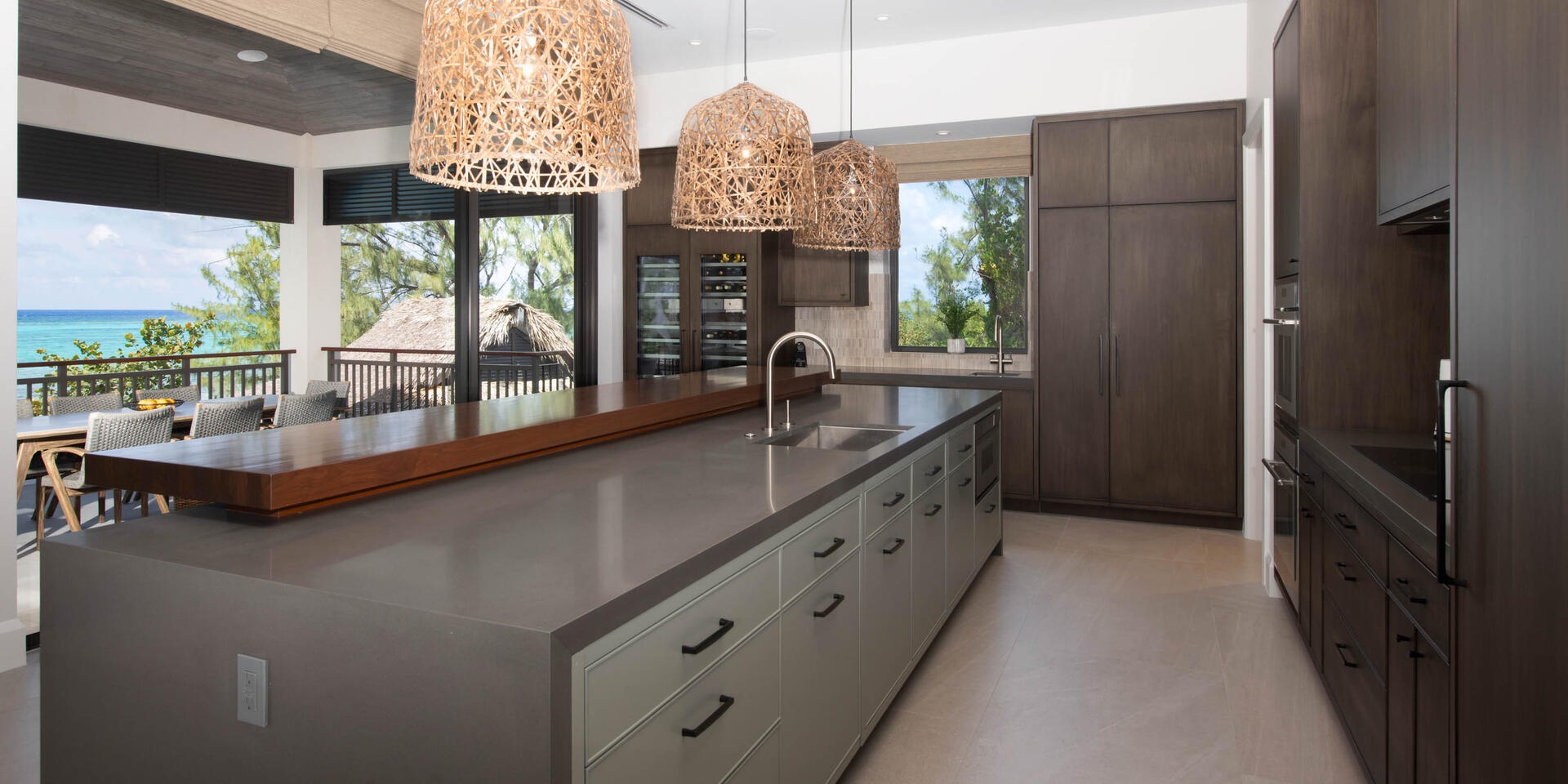 The gourmet kitchen comes stocked with flatware, cookware, glassware, and cutlery.