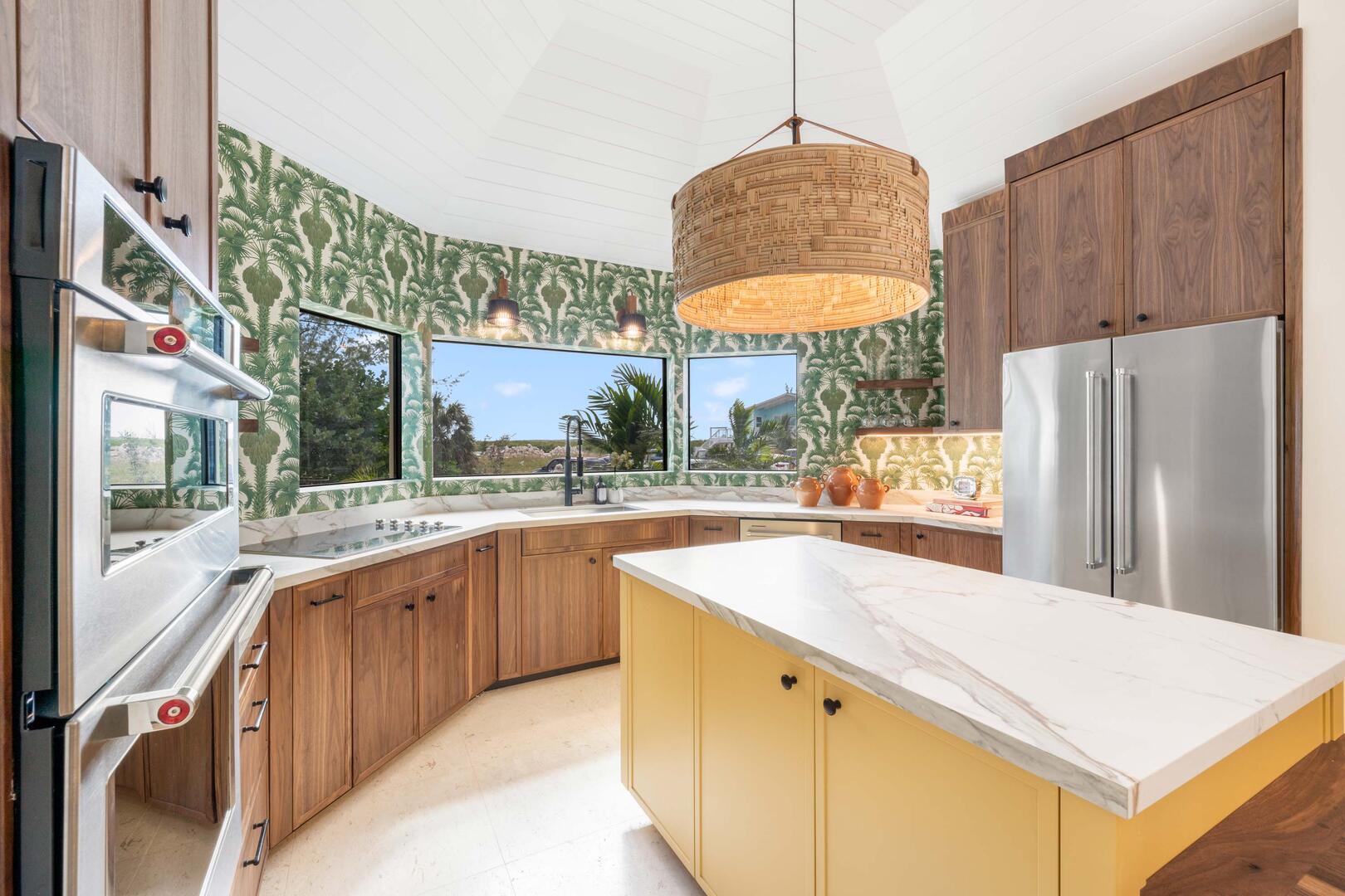 Full kitchen with modern appliances.