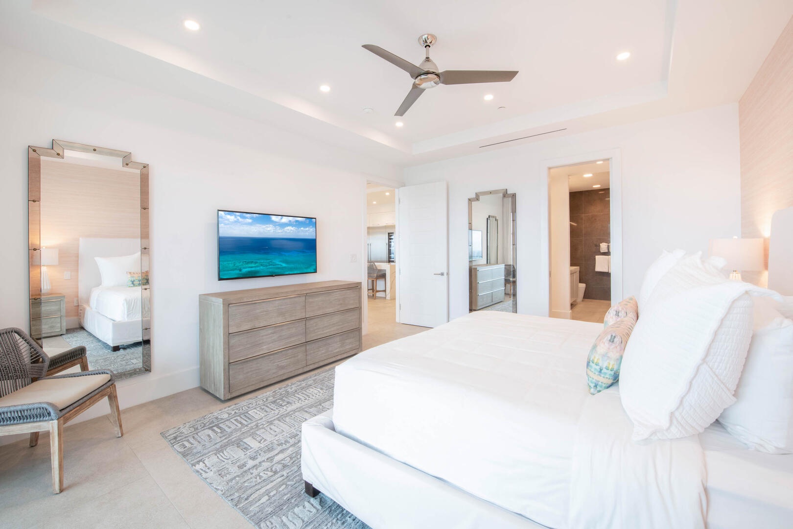 Primary Suite with a walk-thru closet leading into the ensuite bath.