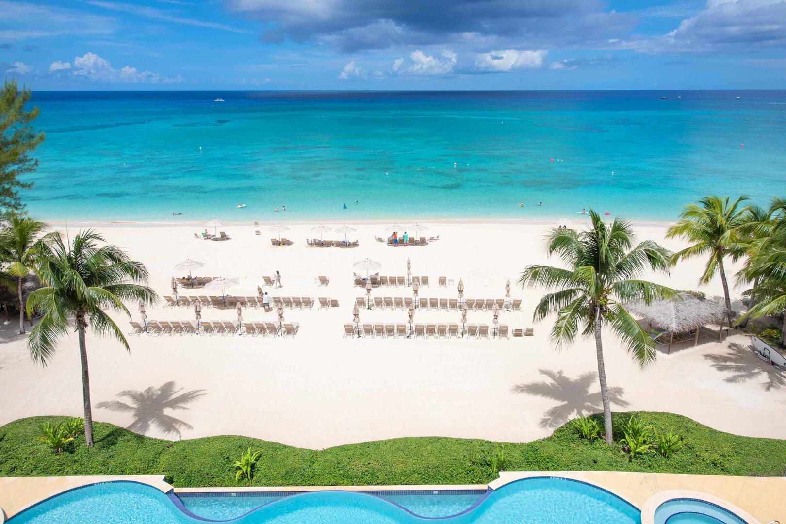 Balcony views of the pool deck and beach.