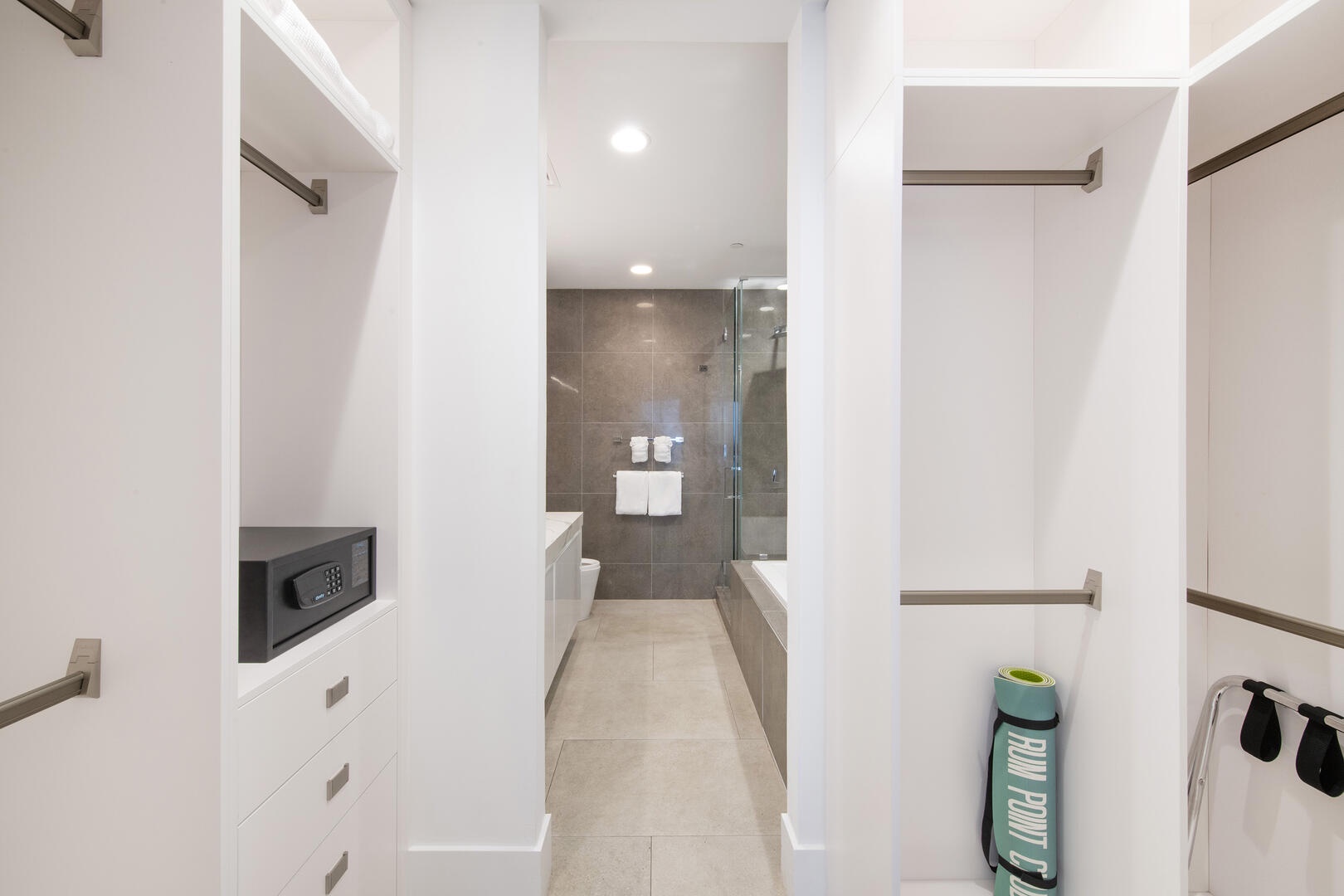 Walk-thru closet with deposit safe.