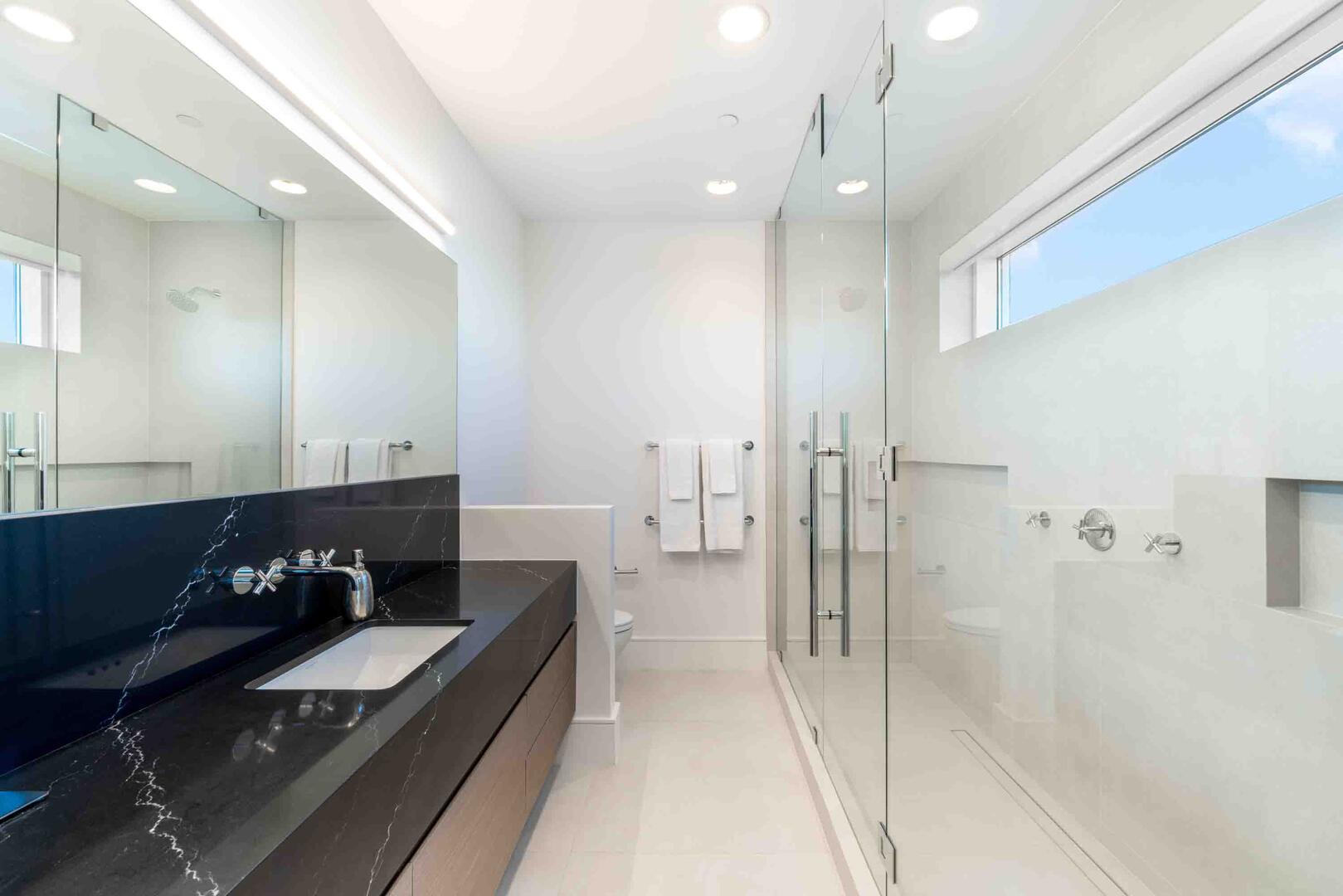 Bedroom 2 ensuite with a large double shower.