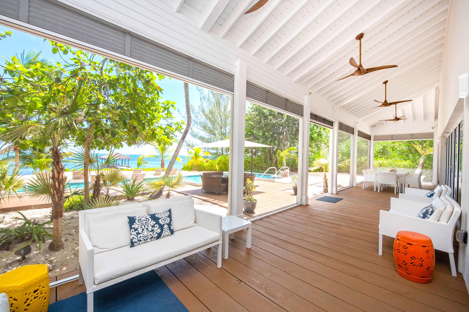 Plenty of seating along the screened porch.