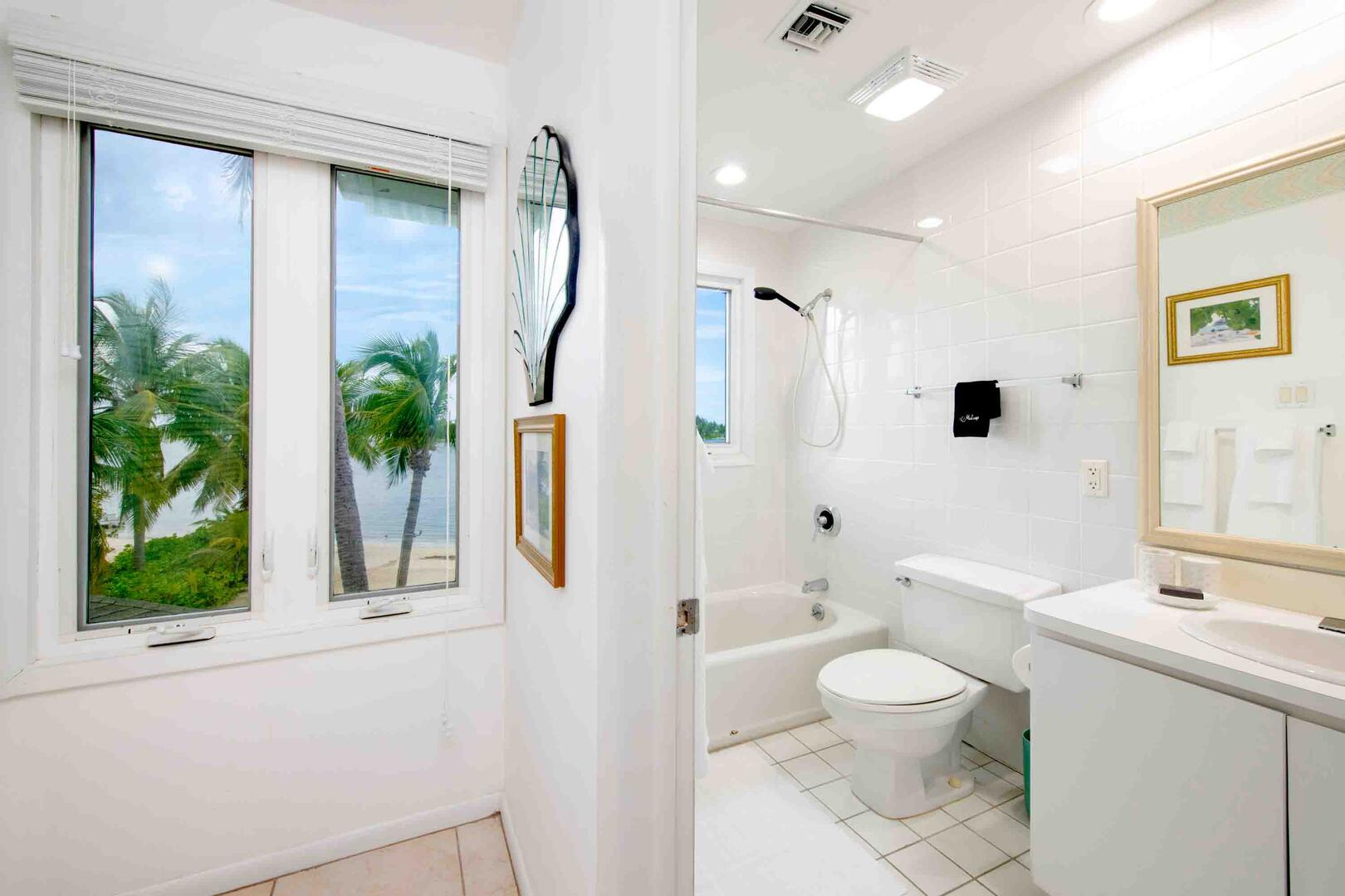 Bedroom 2 ensuite with shower bath. All bath and beach towels are provided during your stay.