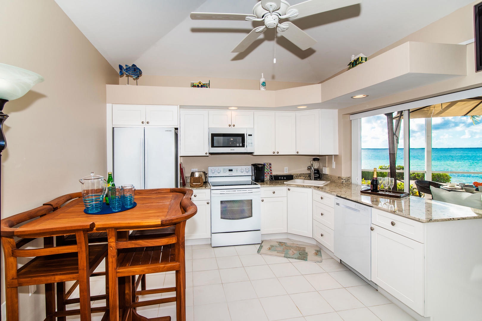 Modern kitchen with a dining table that seats 4.