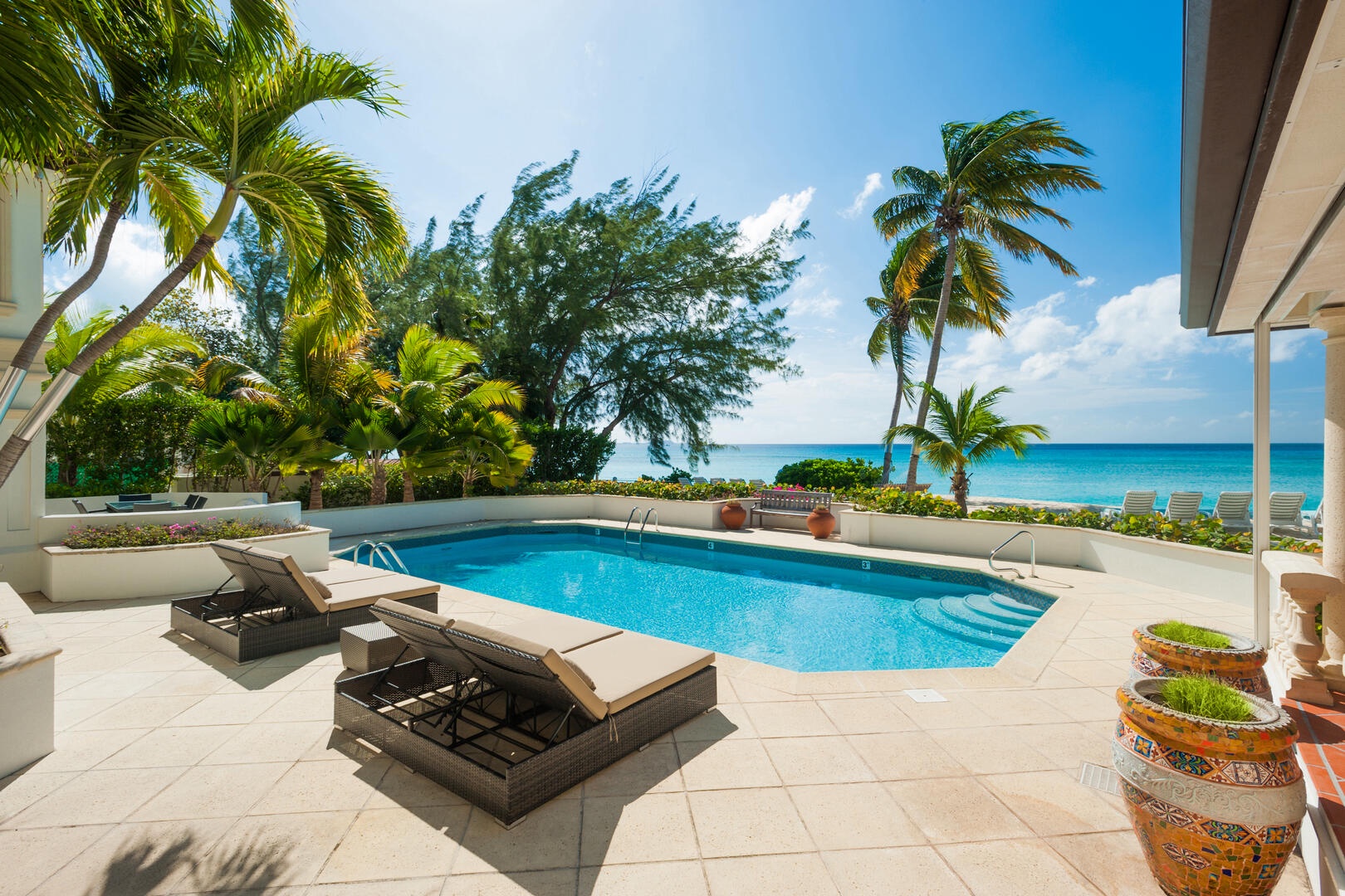 Private pool with views of Seven Mile Beach.