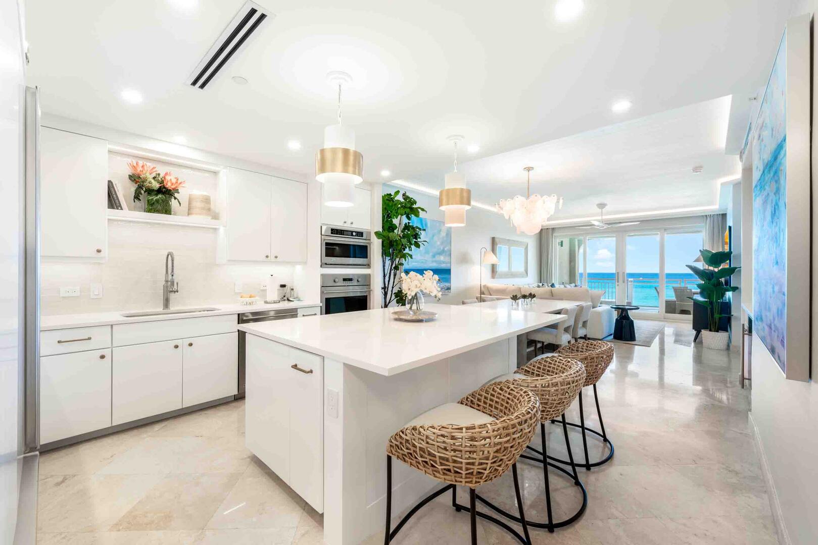 Modern kitchen with a full suite of appliances. All dishes, cookware, glassware, and utensils come provided.