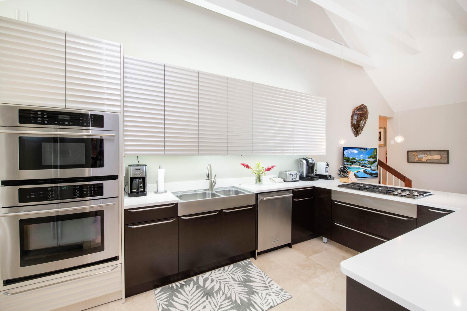 Gourmet kitchen with modern appliances and finishes.