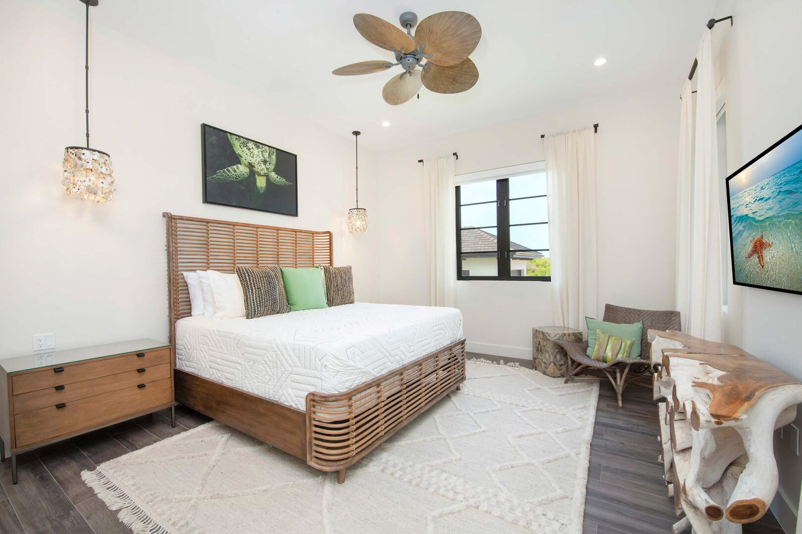 East Suite ? upper-level, king bed, oceanfront, vaulted ceilings, walk-out access to the oceanfront railed balcony, desk, double closets, SmartTV