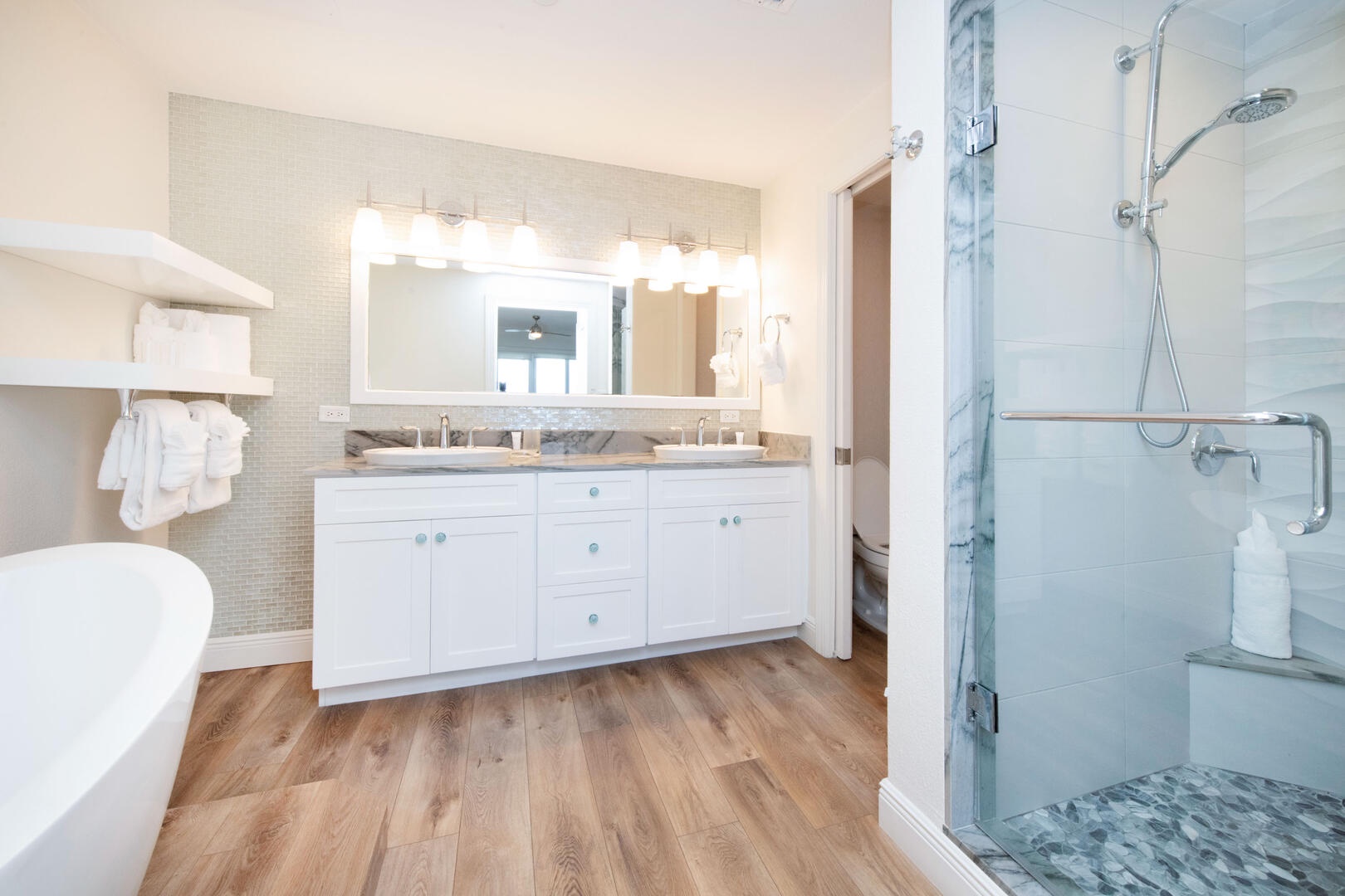 The Primary Ensuite also comes equipped with a water closet and frameless shower.