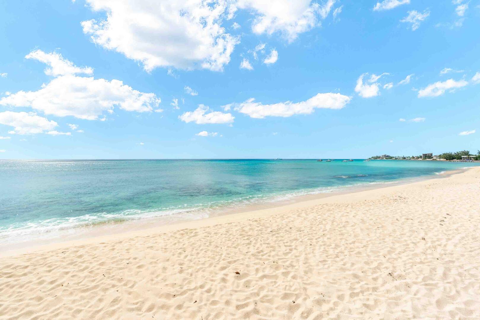 To access the beach, use the stairs at the end of the road towards the gas station.