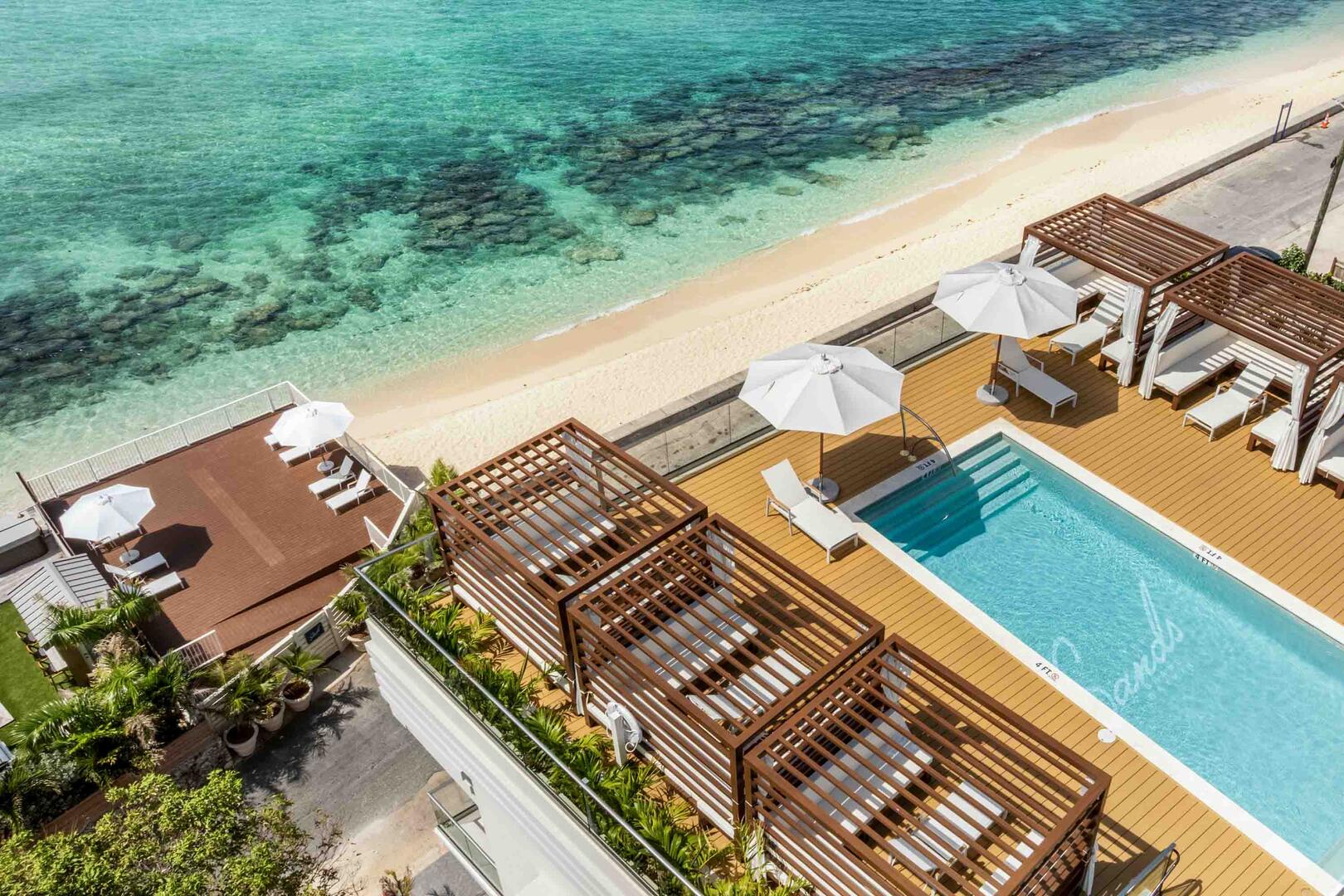In addition to the rooftop pool, guests can also access the beach deck overlooking the ocean.