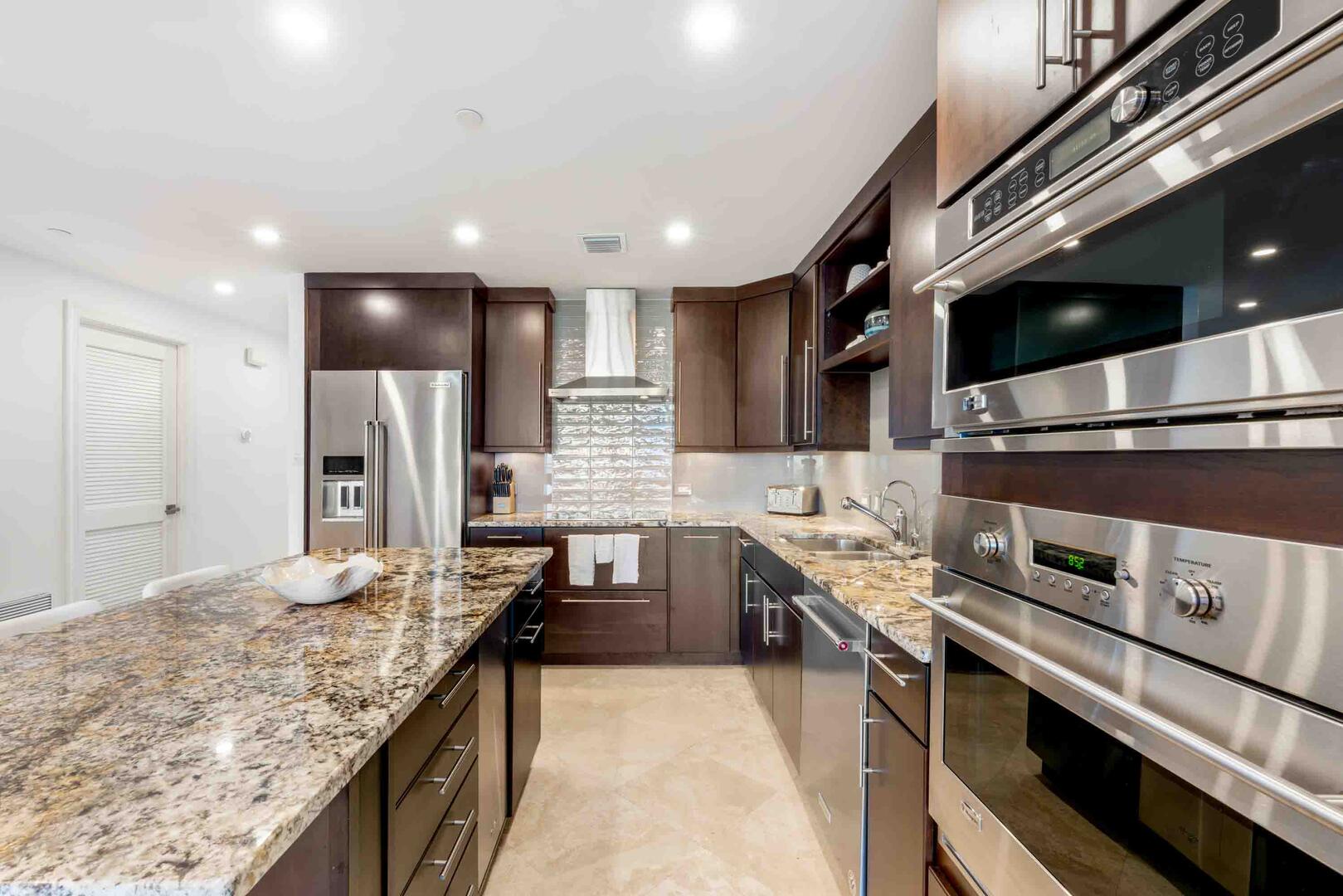 The kitchen is equipped with top of the line appliances.