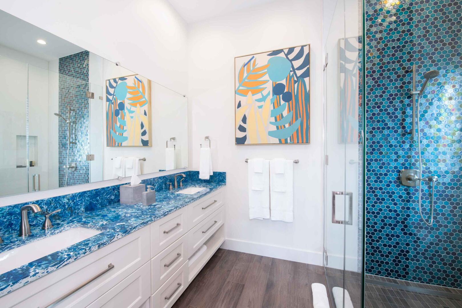Twin Suite ensuite bath with double vanity, and walk-in shower