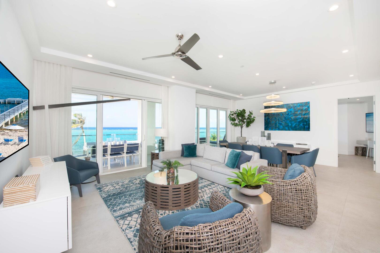 Family room with coastal decor and sumptuous ocean views.