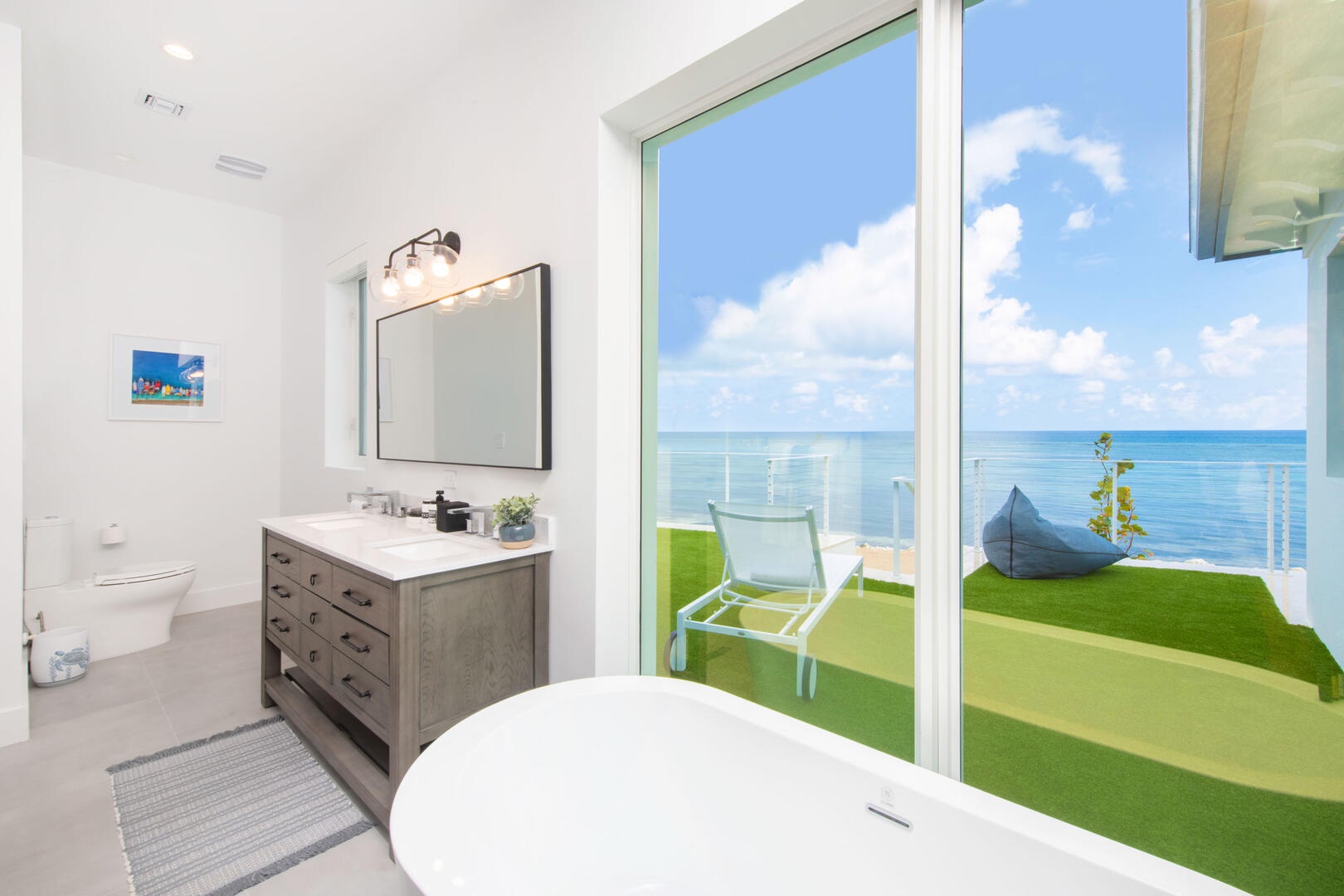 West suite ensuite bathroom with tub.