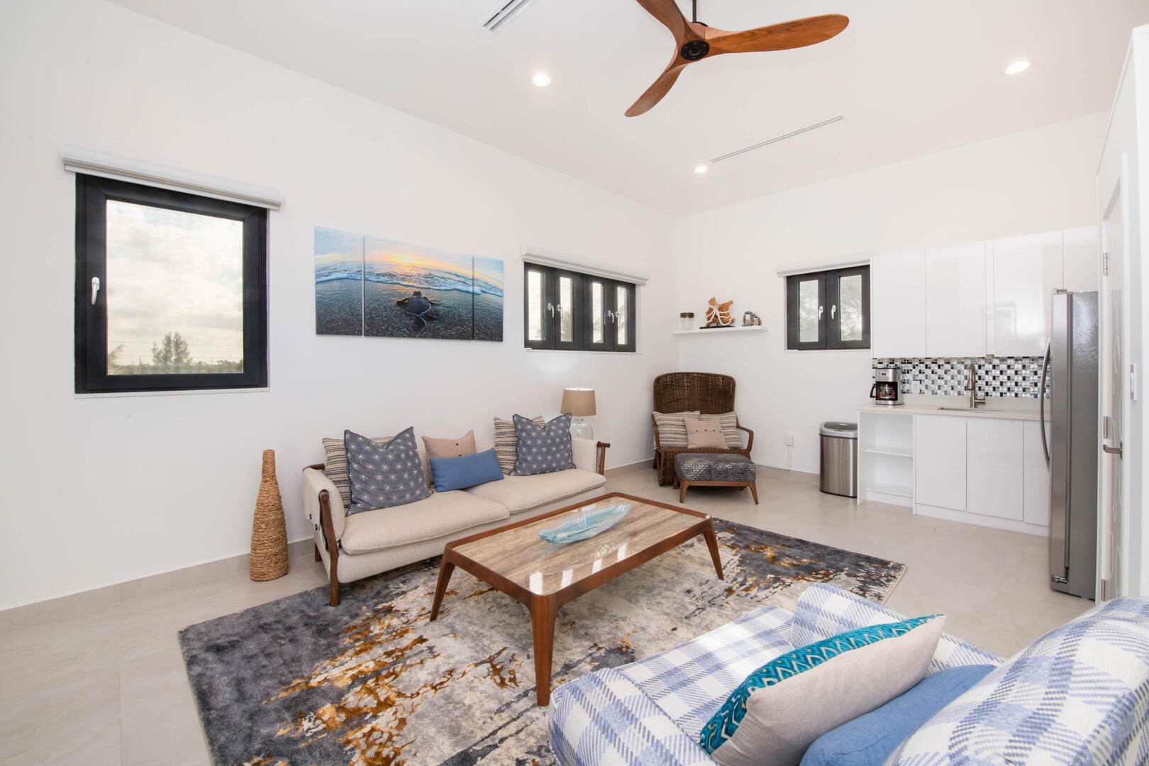 Upper den with small kitchen.