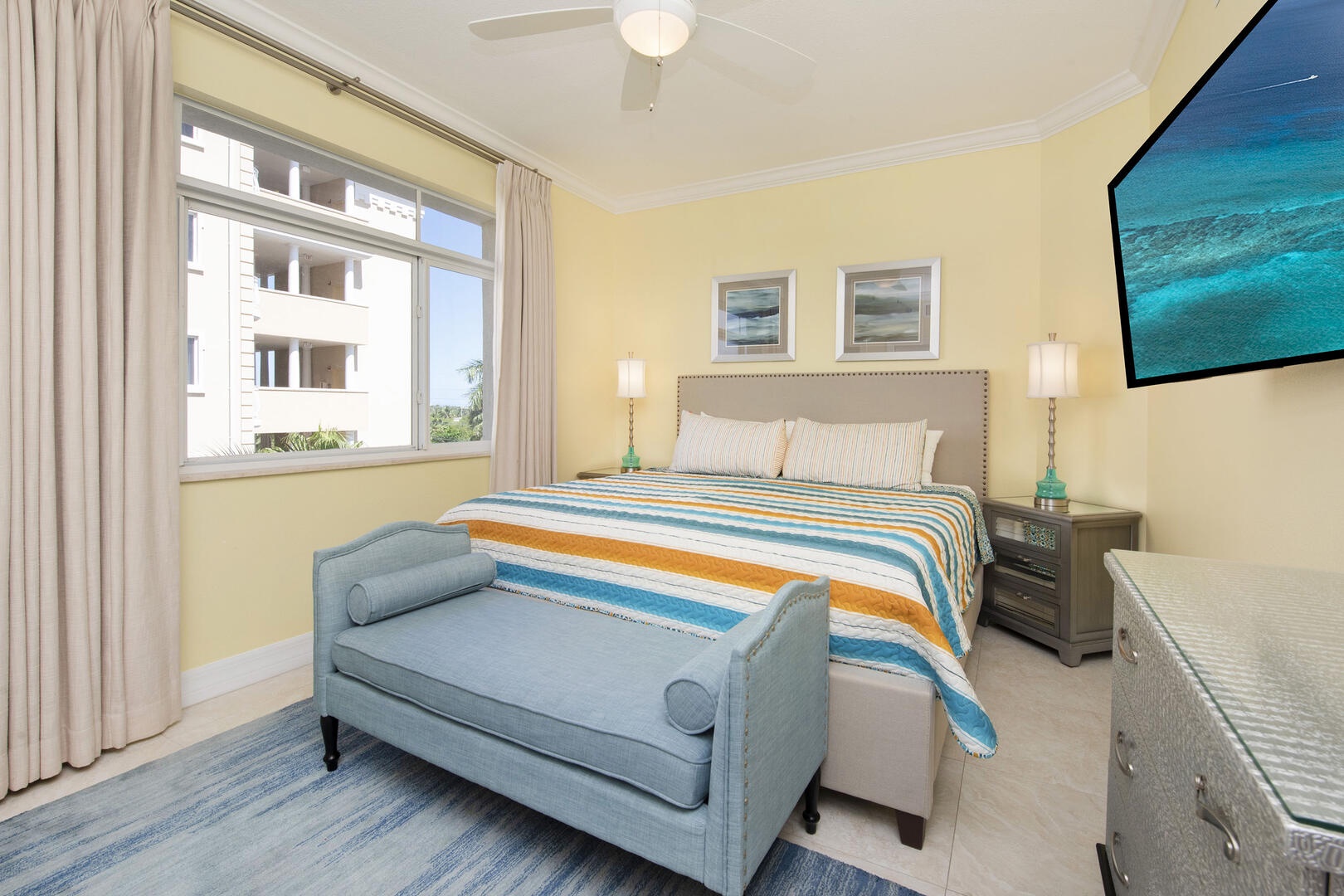 Guest Suite #1 with king bed and television.