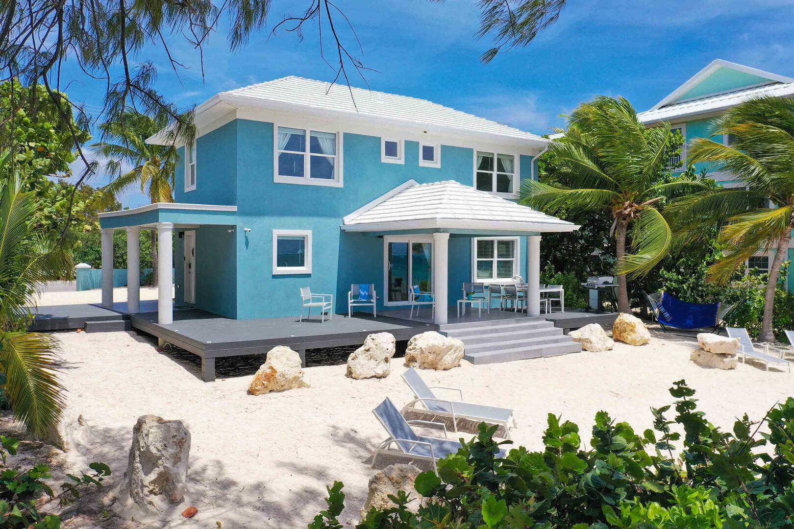 Sun lounges by beach.