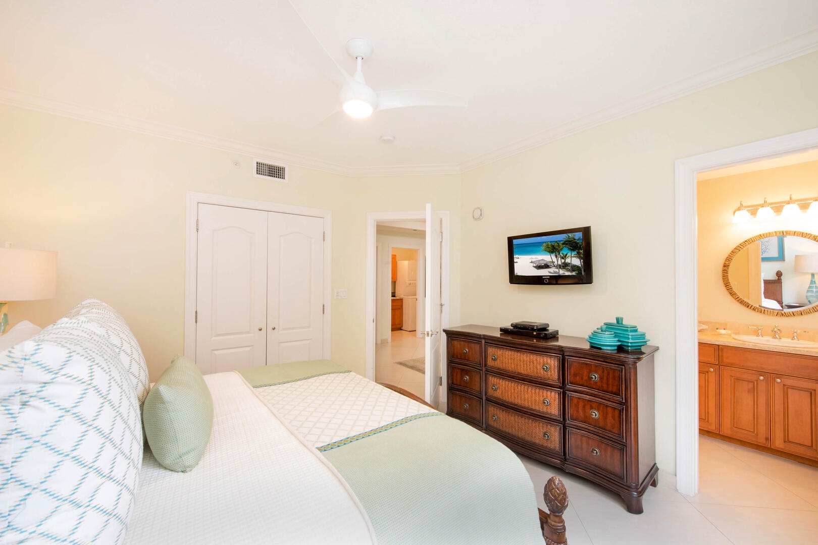 Bedroom 2 with king bed, HD cable TV, and ensuite.