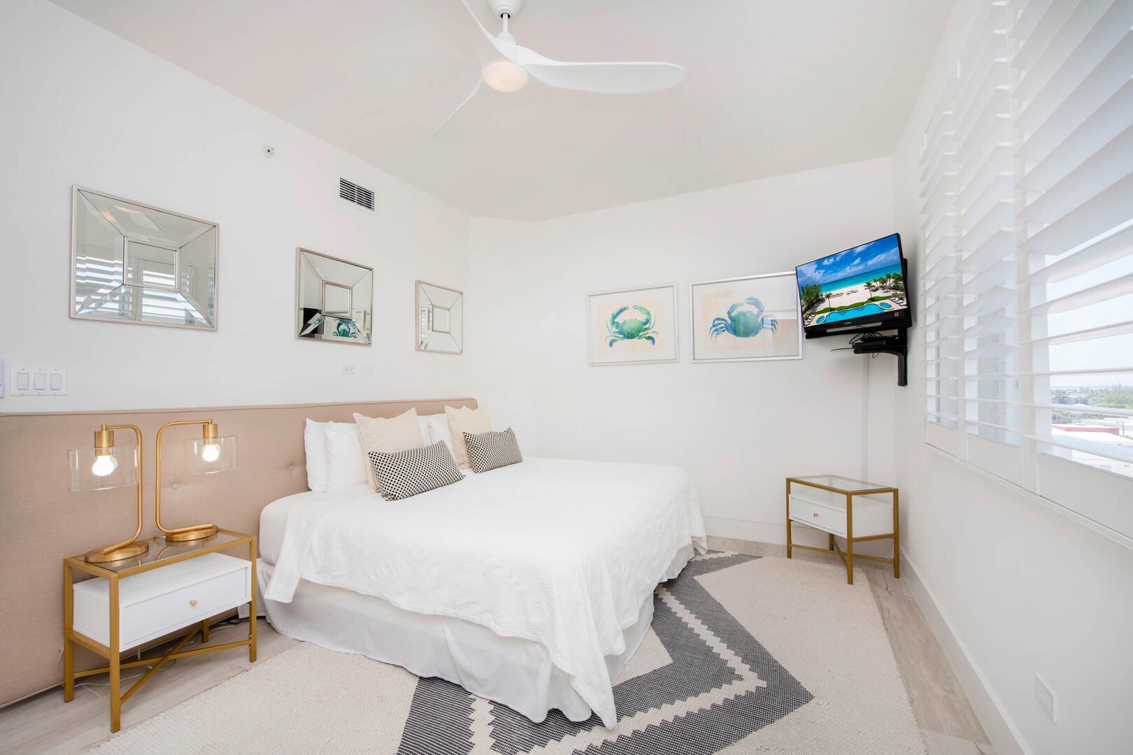 Guest Suite #2 with 2 twin beds and television. Twins are fitted as a king bed in photos.