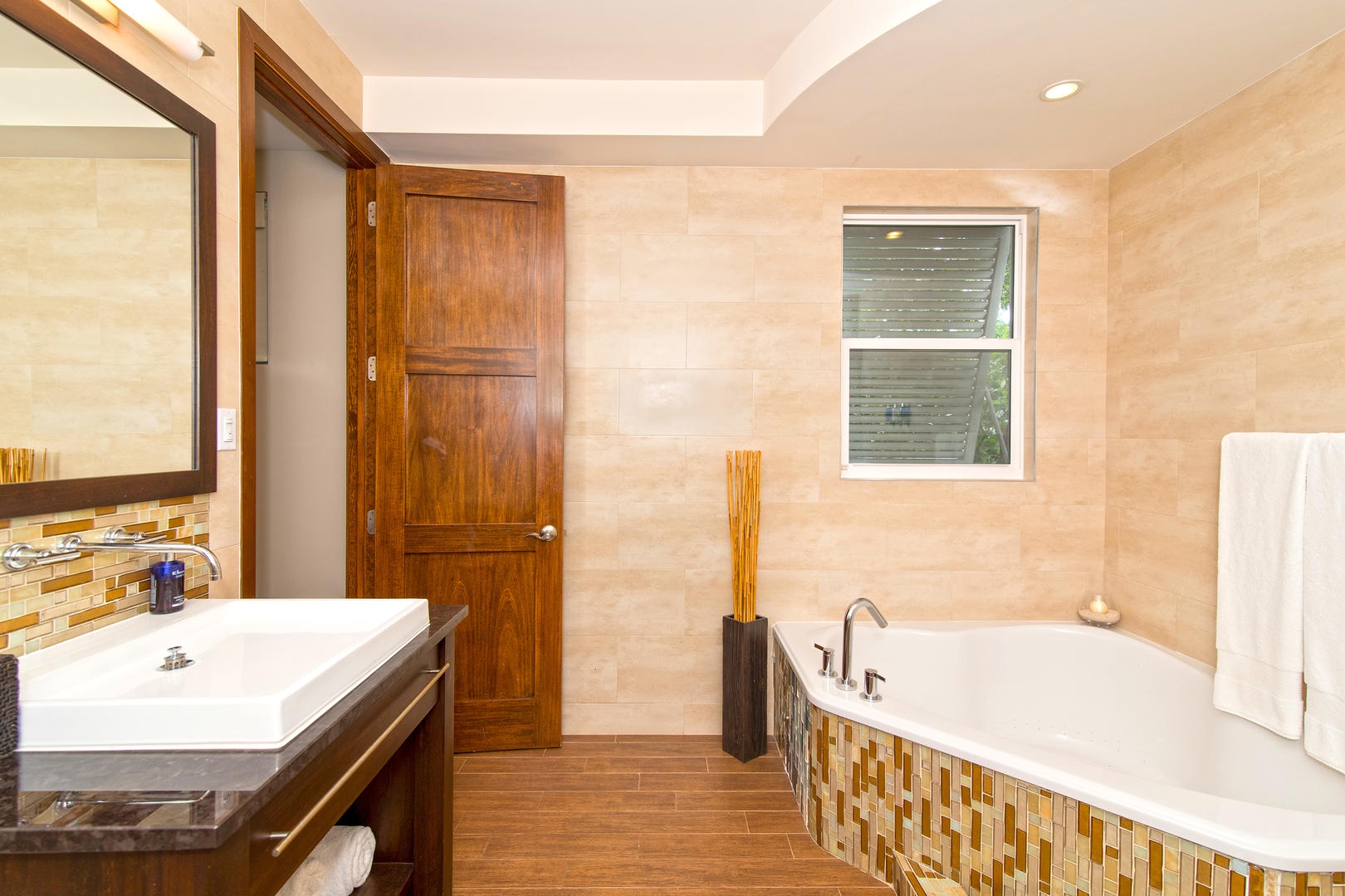 Master bath with a soaking tub and walk-in shower.