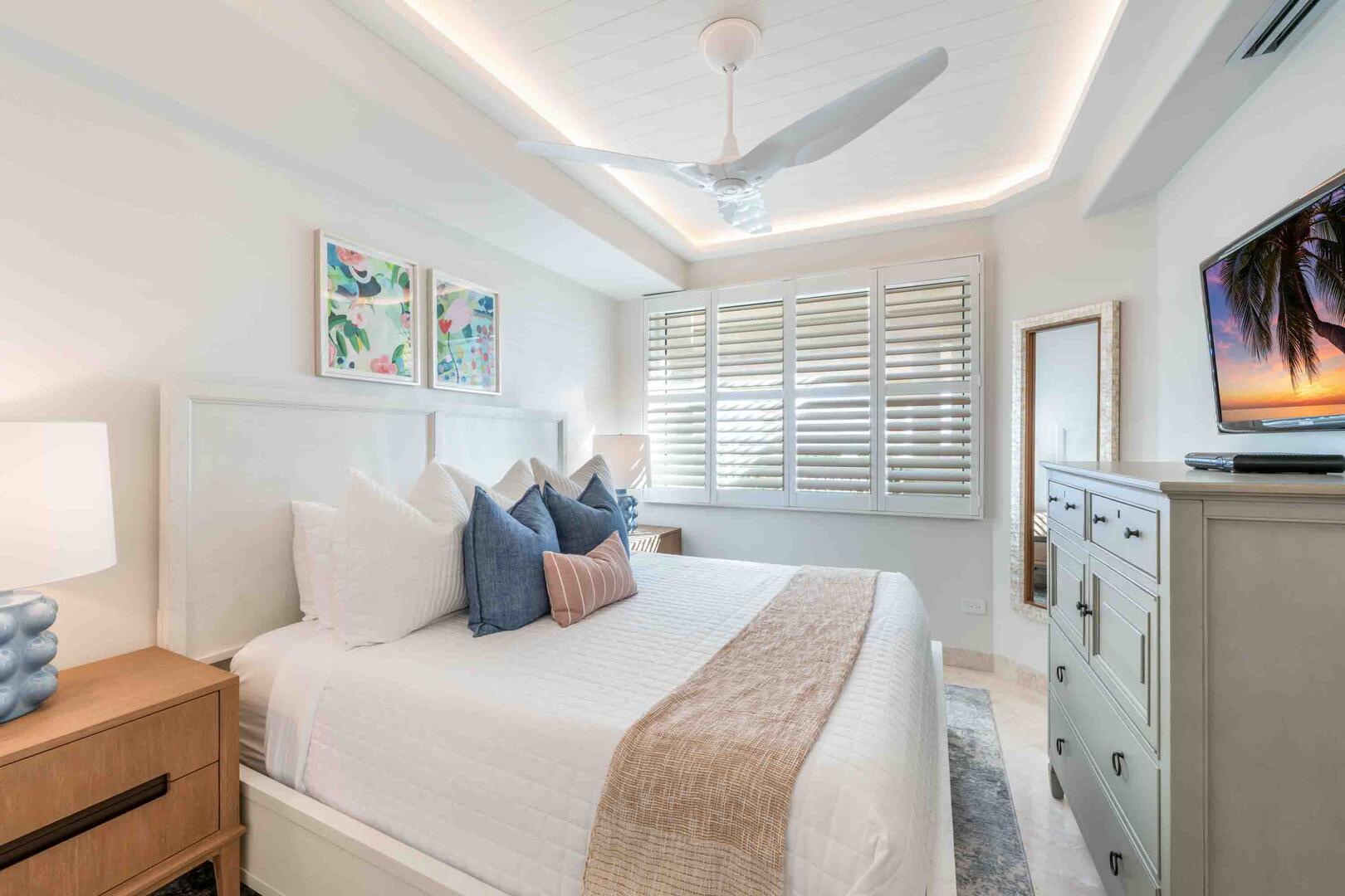 Guest Suite 1 furnished with a king bed and cable television.