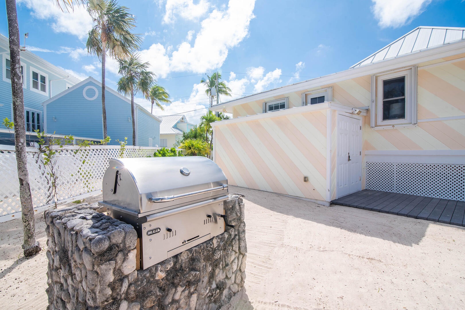 Charcoal grill for island cookouts by the sea.