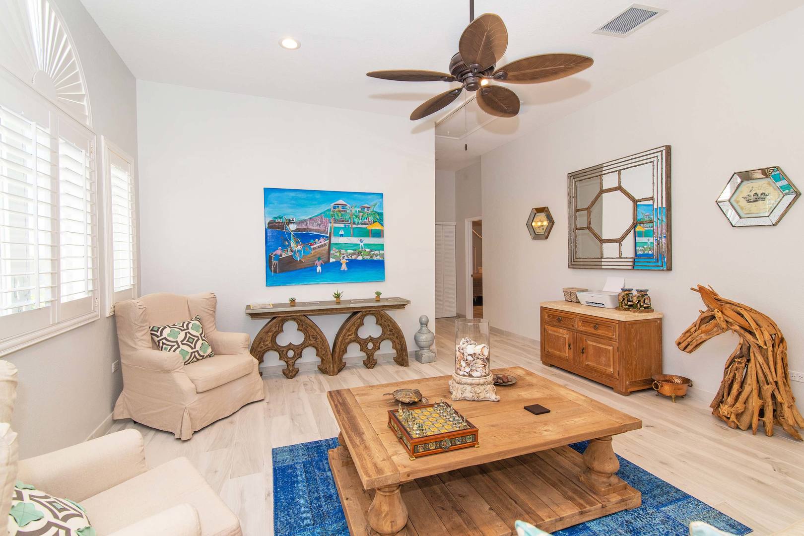 Upper level living room with modern decor.