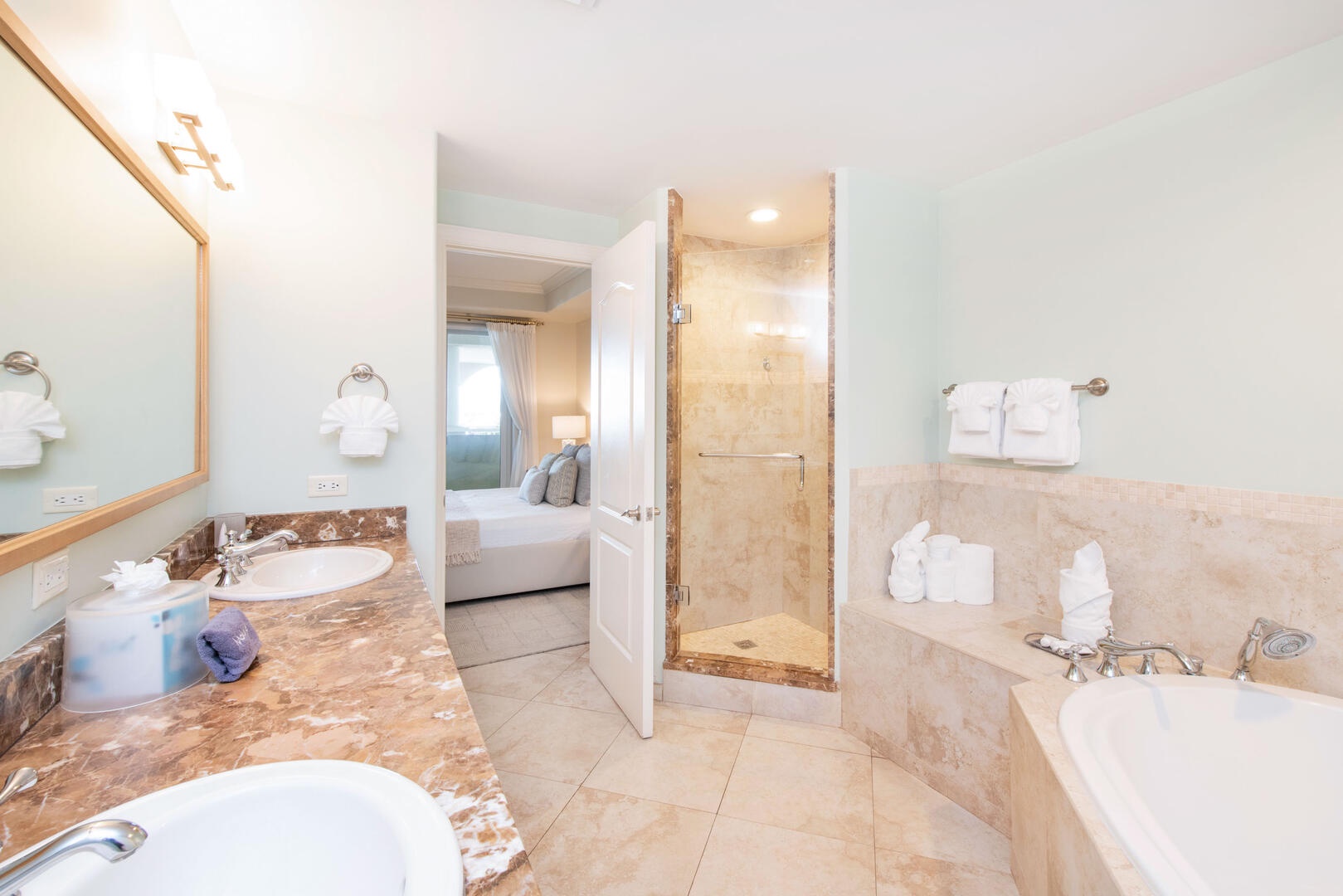 The primary ensuite also features a separate walk-in shower.