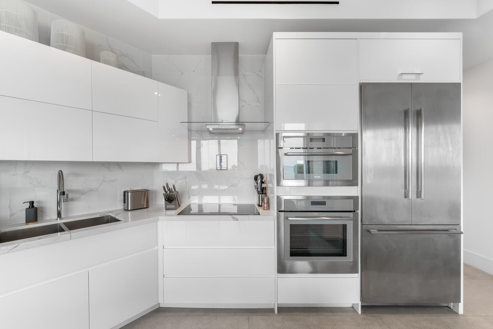 Full kitchen with modern appliances.