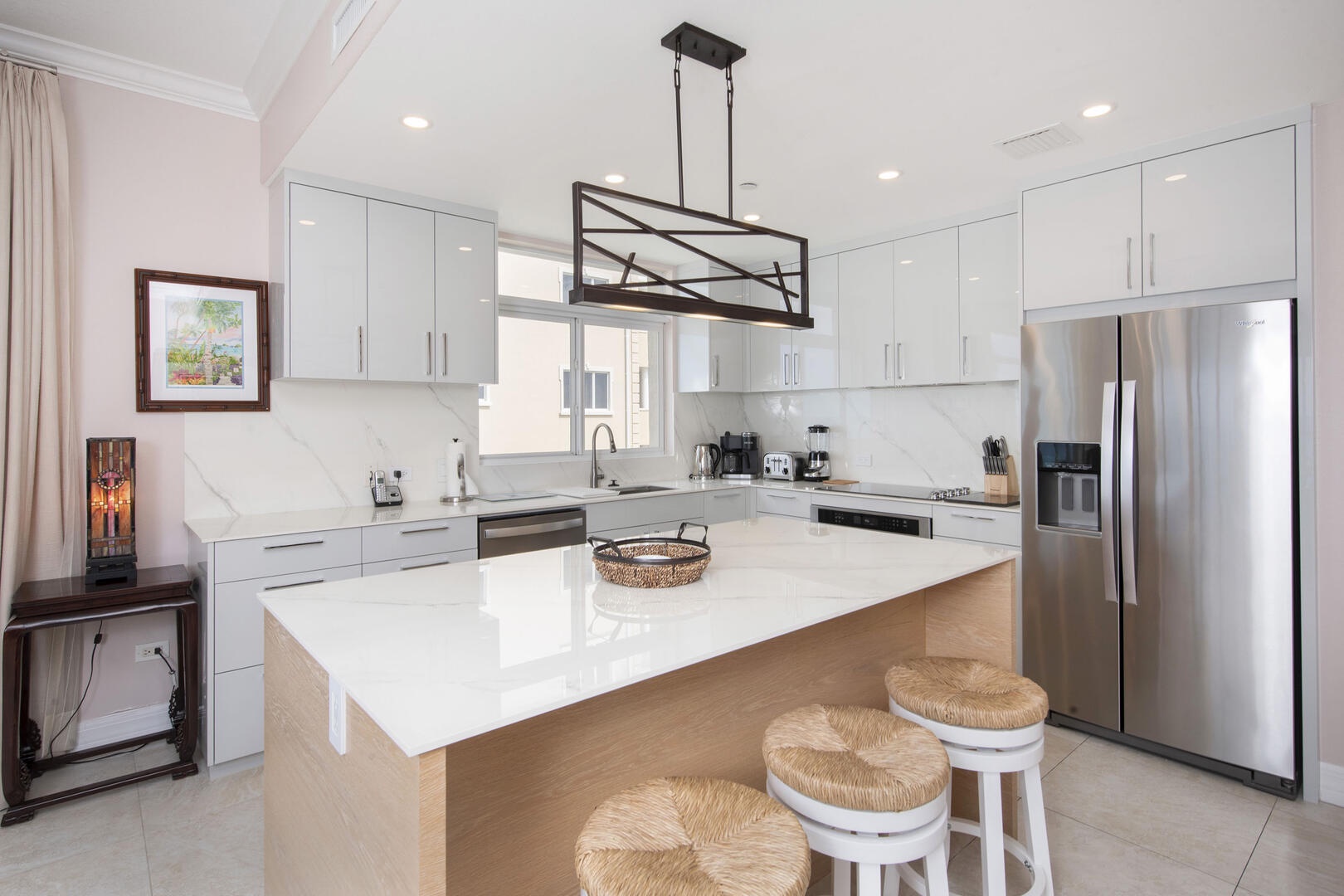 Fully upgraded kitchen with modern cabinets and stainless steel appliances.