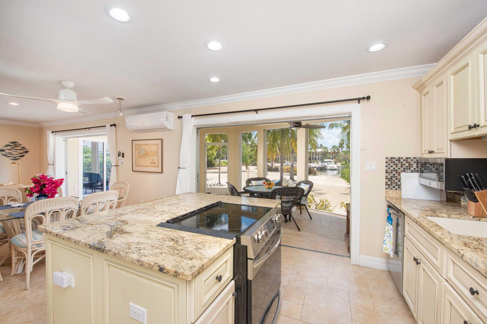 Kitchen opens out onto the lanai.