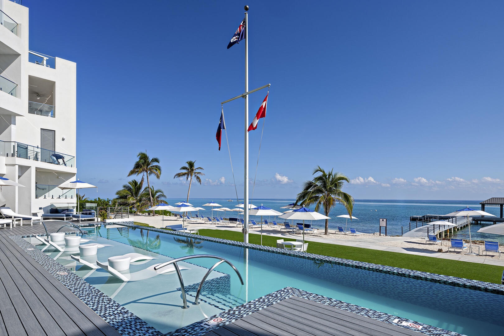 The resort's heated infinity pool features a baja shelf with submersed ledge loungers to melt your worries away.