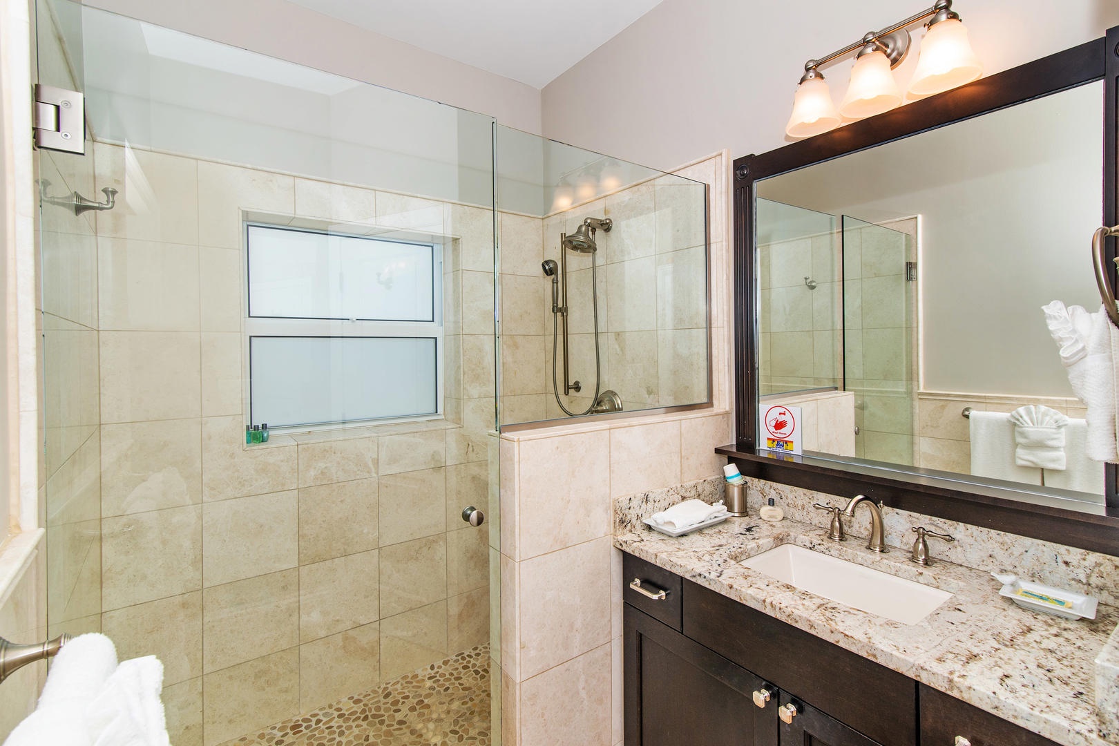 Upper North Suite bathroom with glass shower.