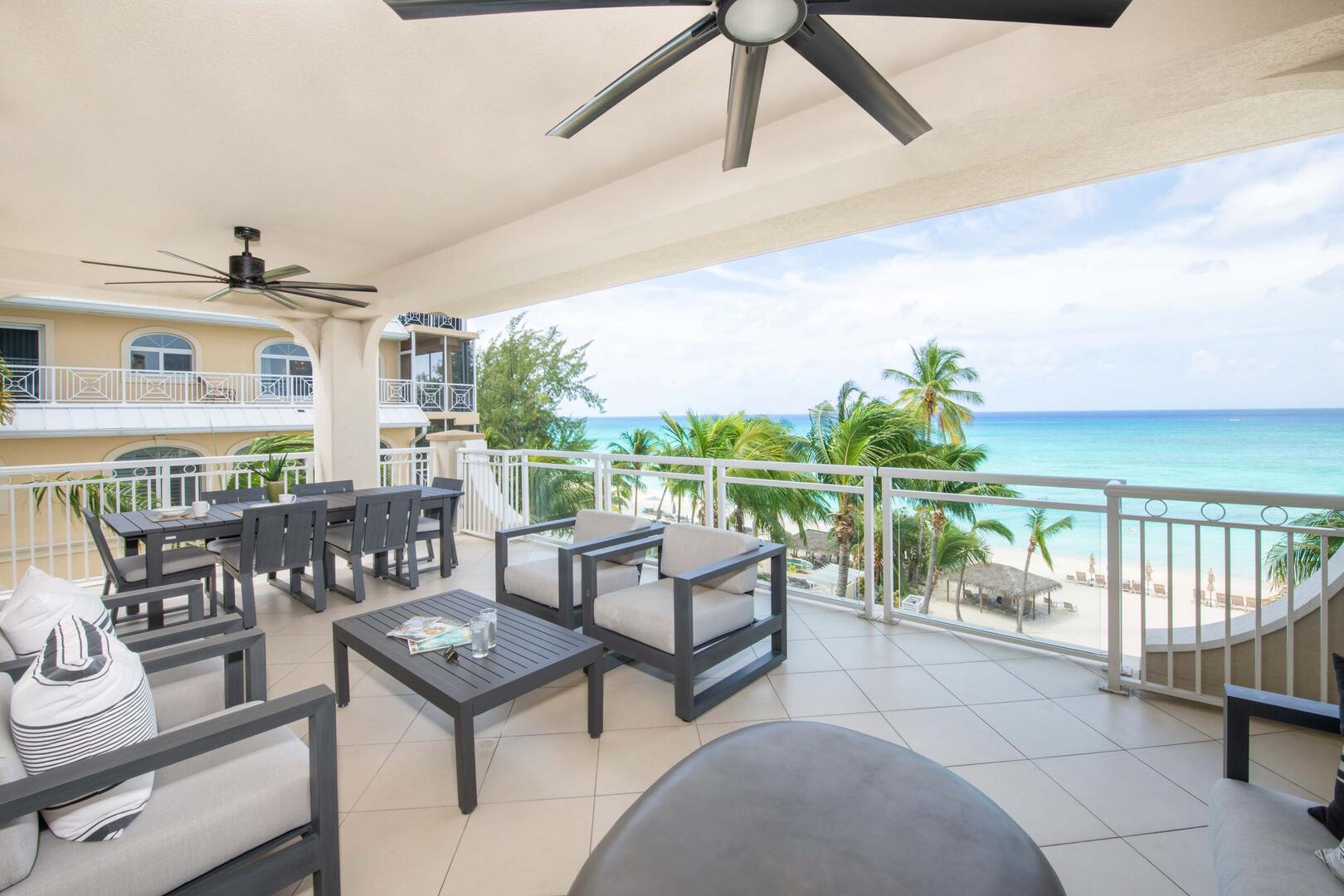 Furnished balcony with oceanfront views.