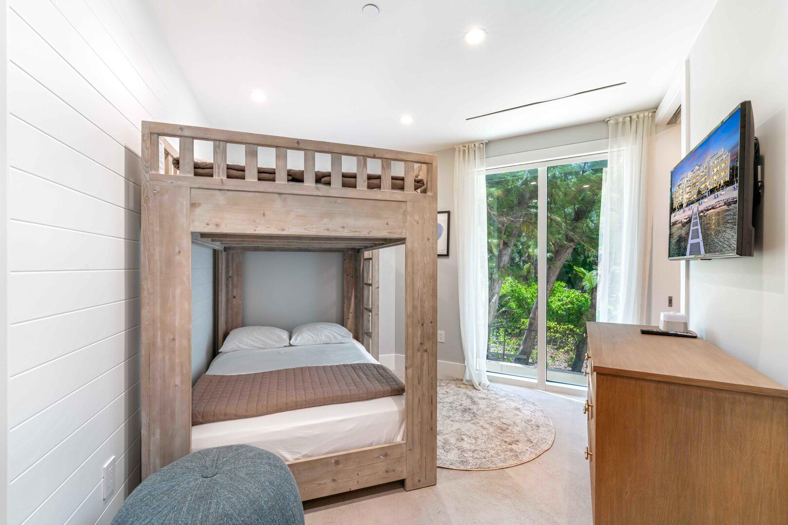 Bunk Suite with full over full bunk beds and HD television. Sleeps 2 adults or 4 children.