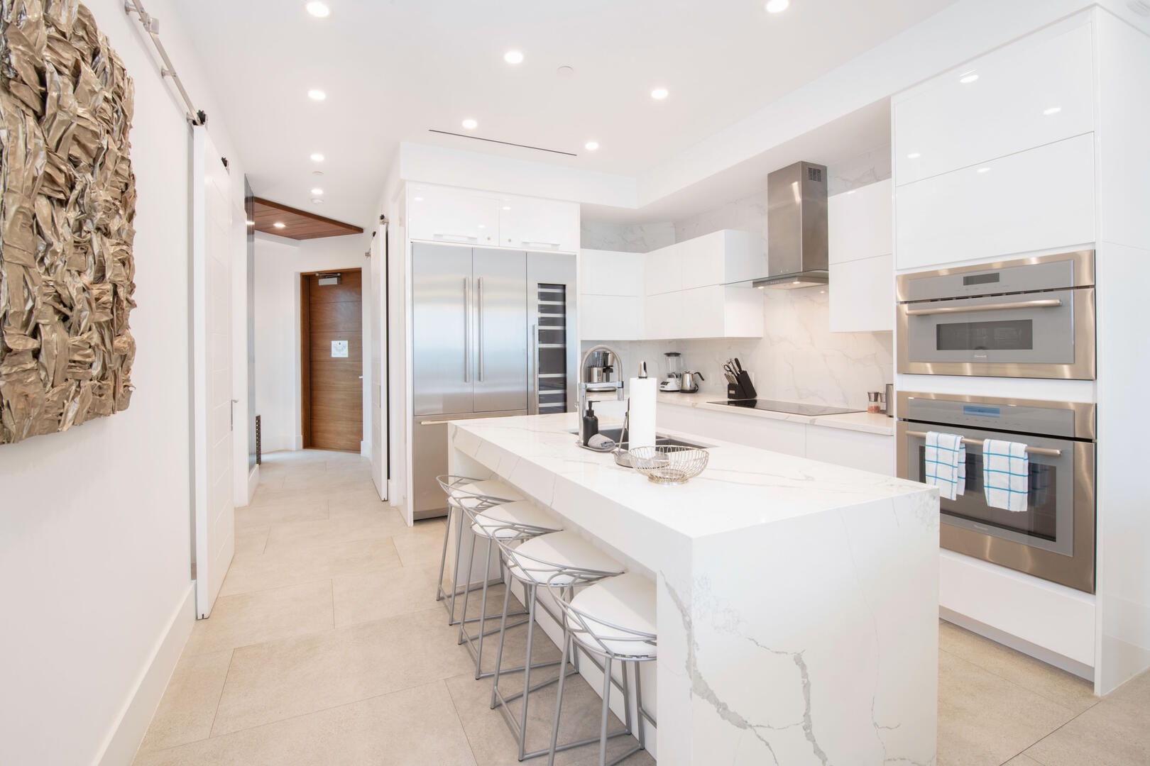 Full kitchen with island seating.