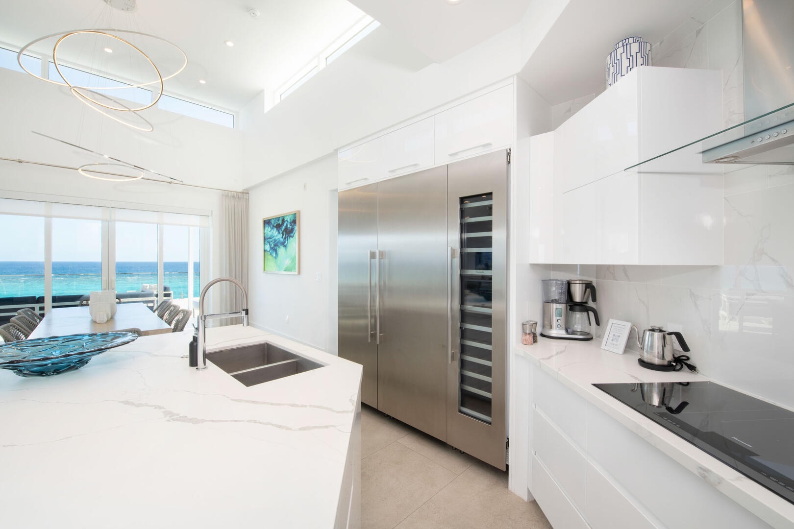 Fully stocked kitchen with gourmet appliances.