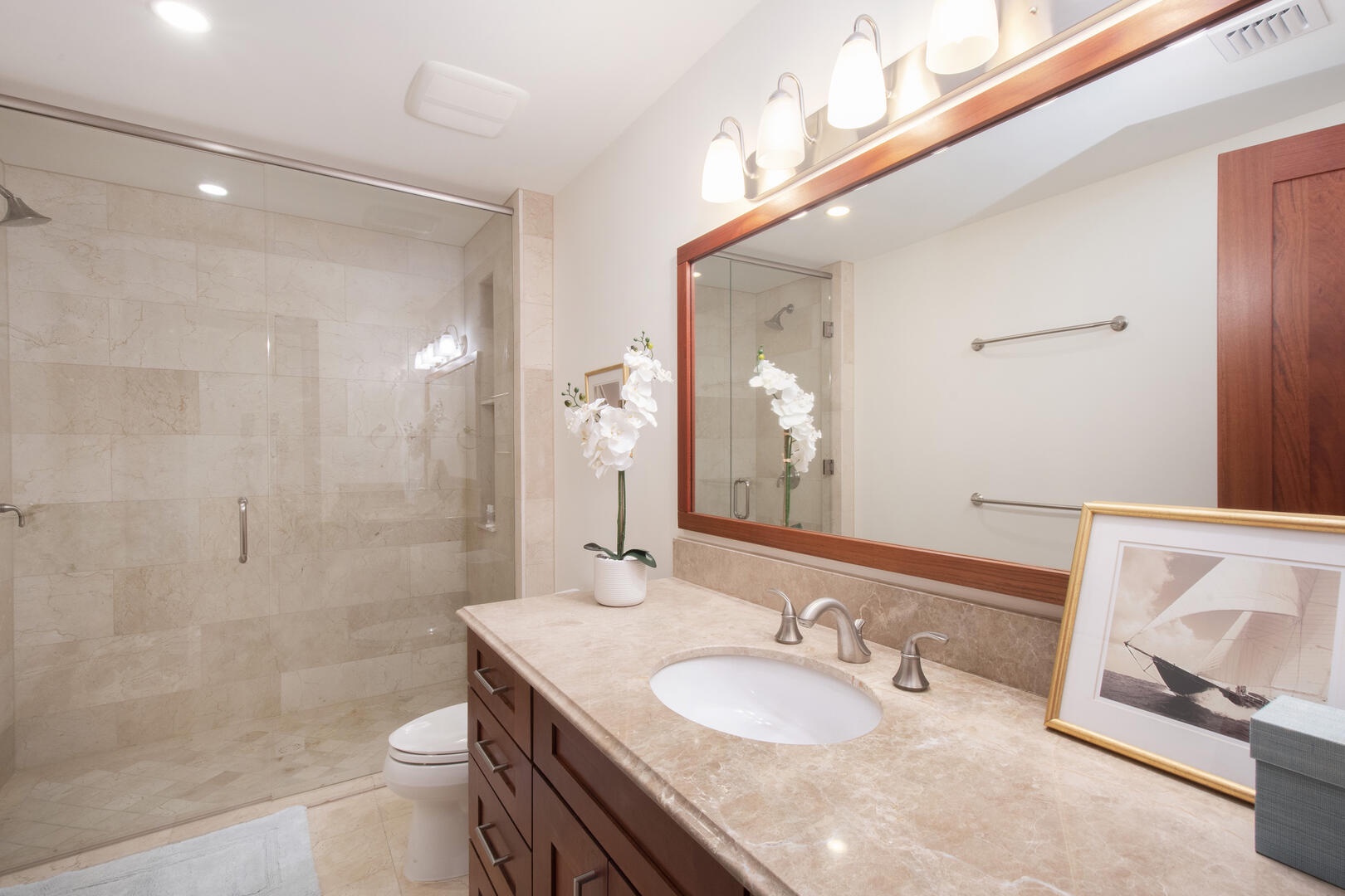 Full bath on lower-level landing.