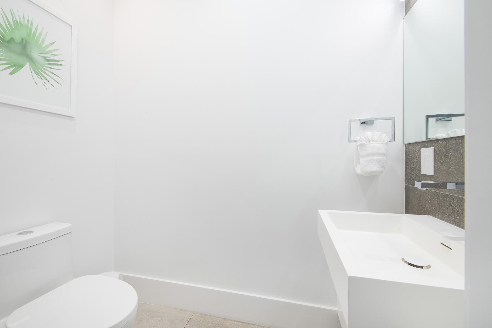 Powder room off the foyer.