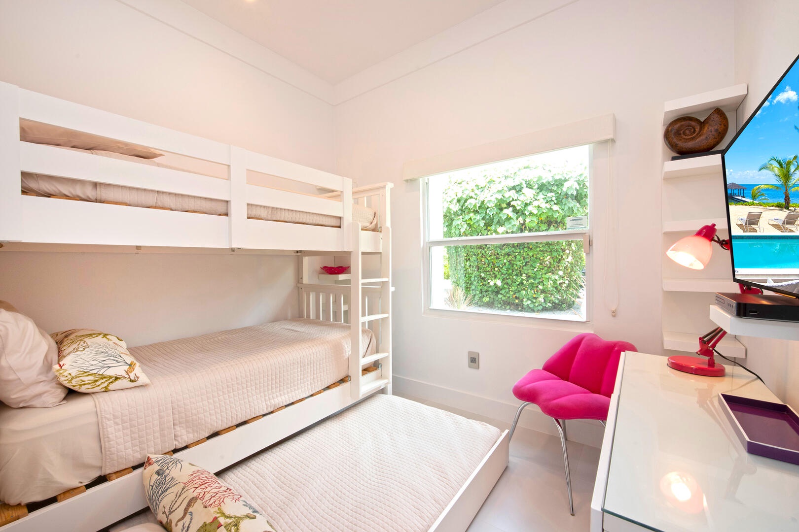 Bunkroom with trundle bed.