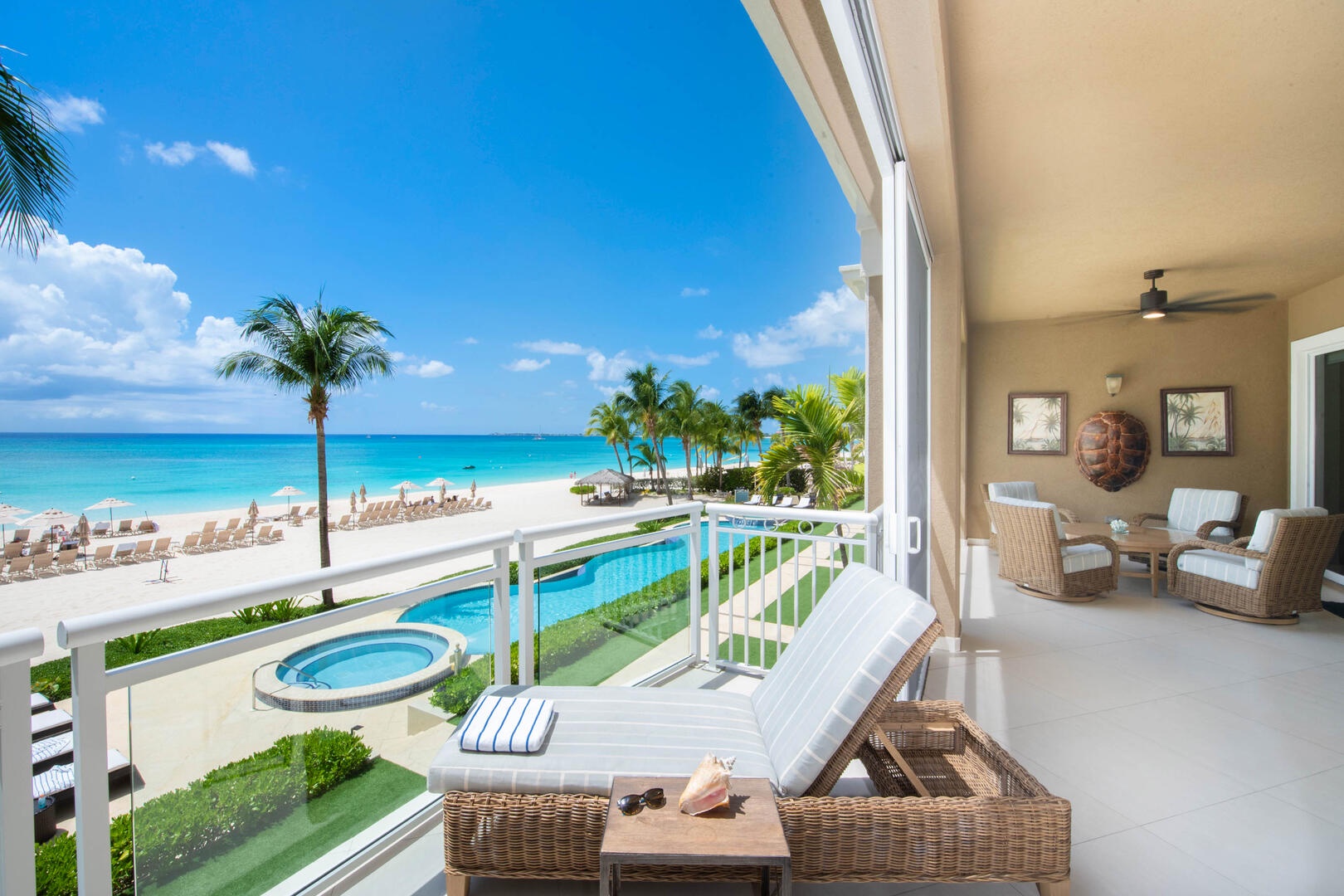 Screened balcony with elevated views of Seven Mile Beach.