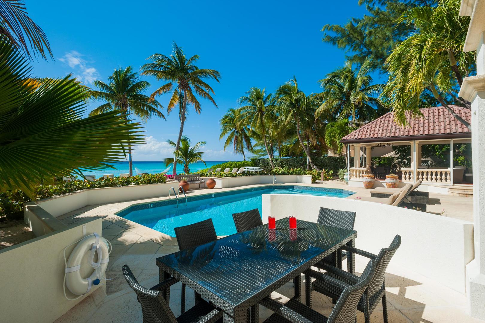Dine al fresco at the outdoor table with beautiful blue views.