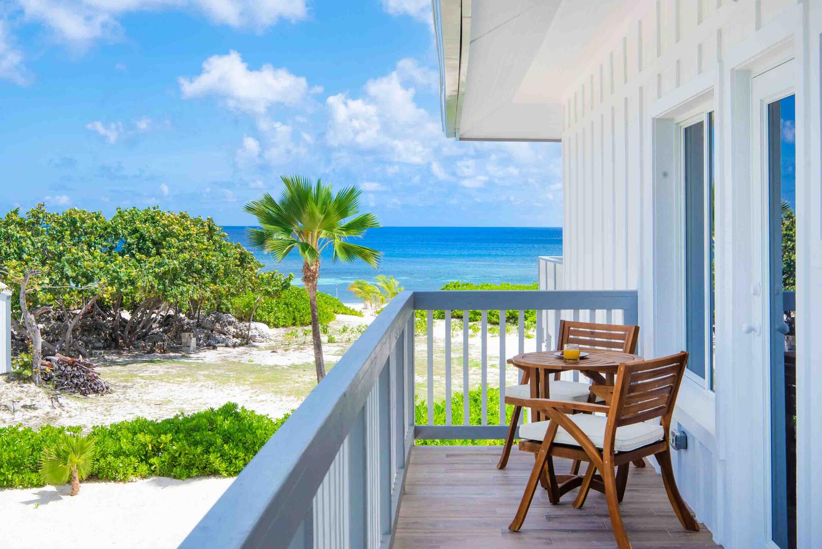 Shared bedroom balcony with ocean views.