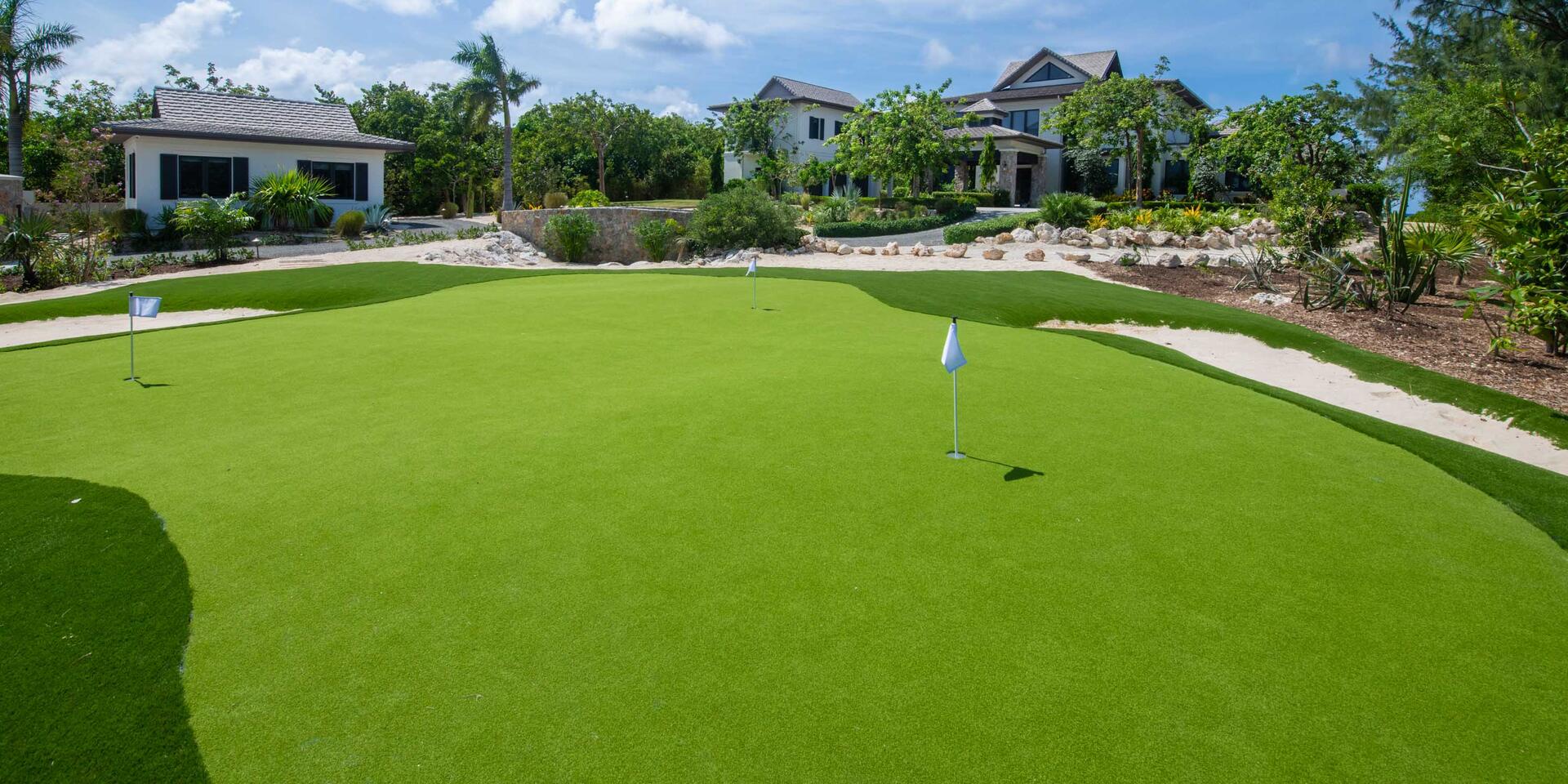 Work on your golf game on the villa's private practice green with multiple tee boxes and sand traps. Wedges, putters, and balls provided.