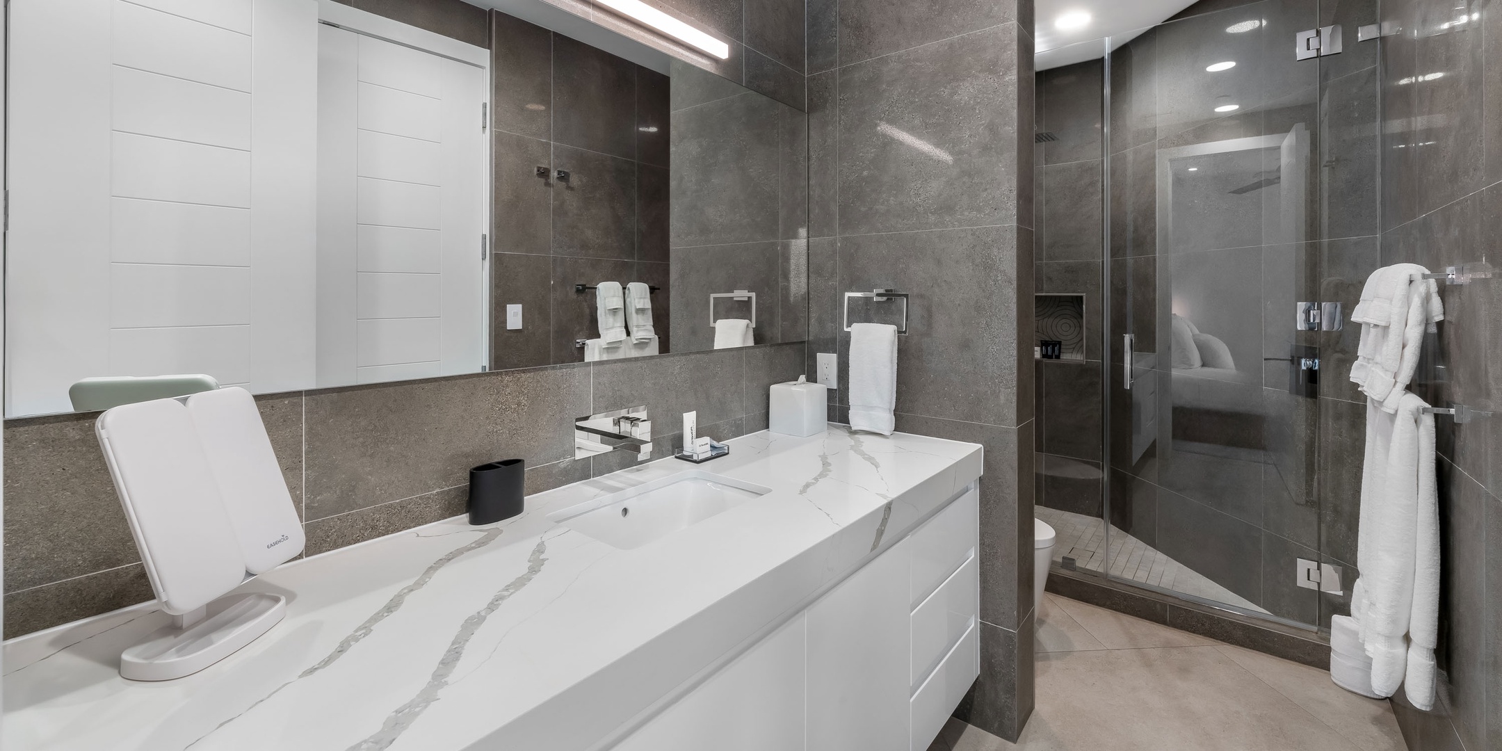 Primary ensuite with shower. All beach and bath towels are provided for your stay.