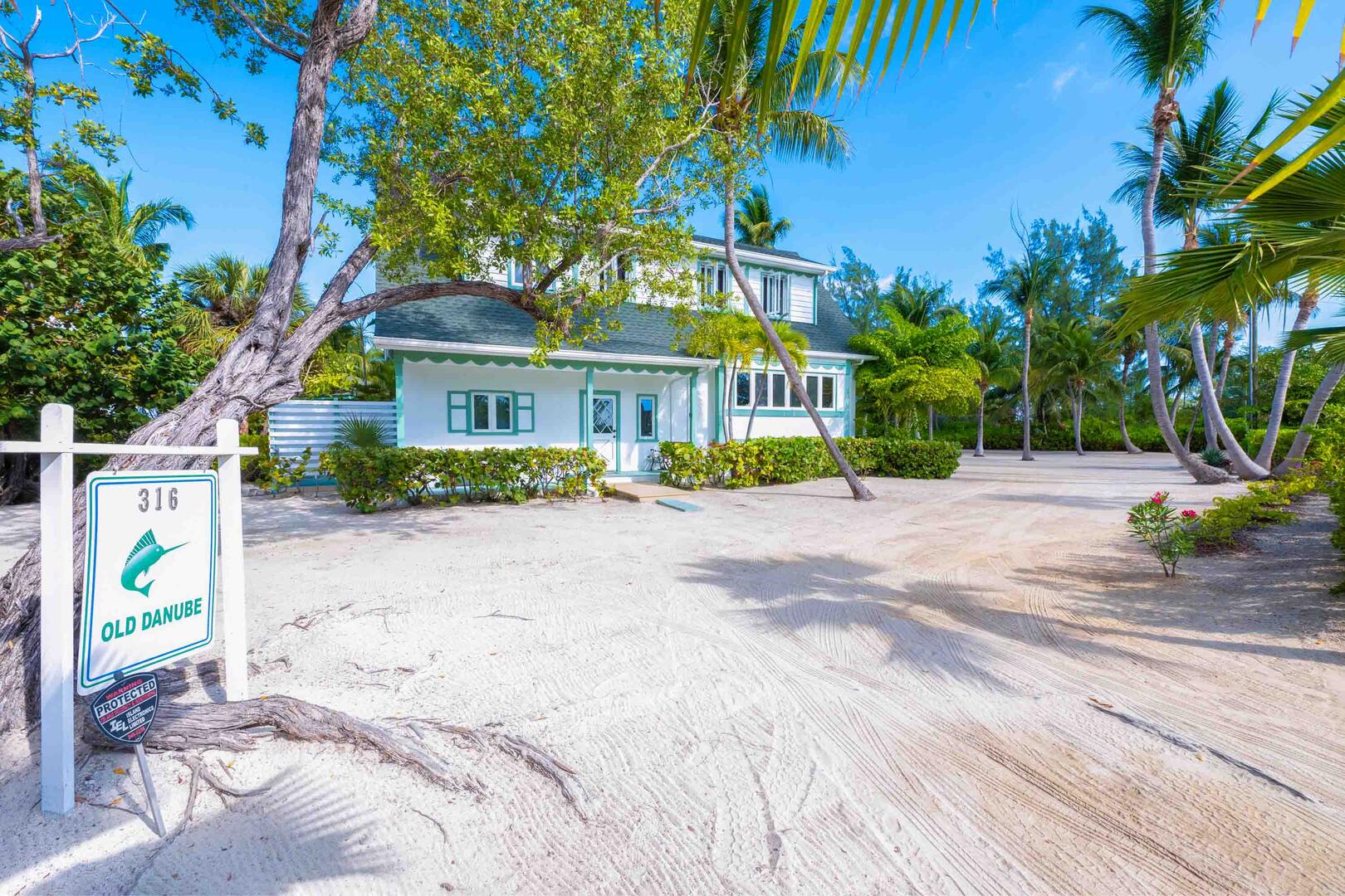 Signage on the street marks your spot in paradise.