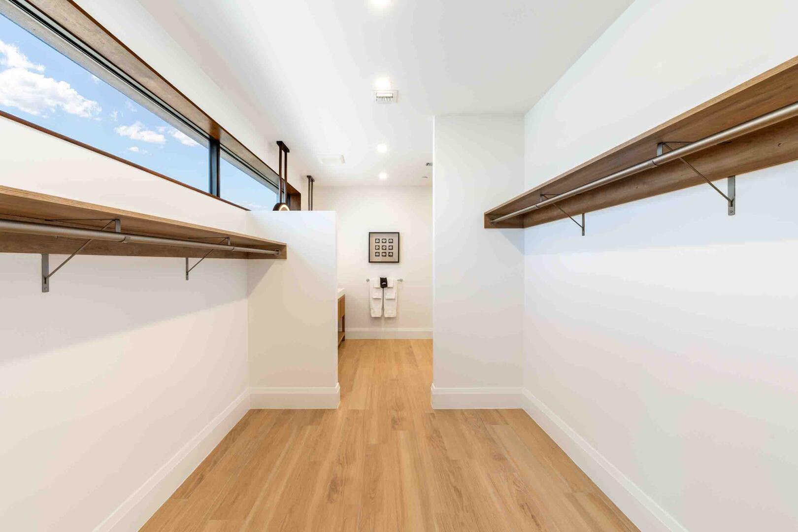 Large walk-thru closet leading to the Primary Ensuite. A guest safe is provided to store your valuables.