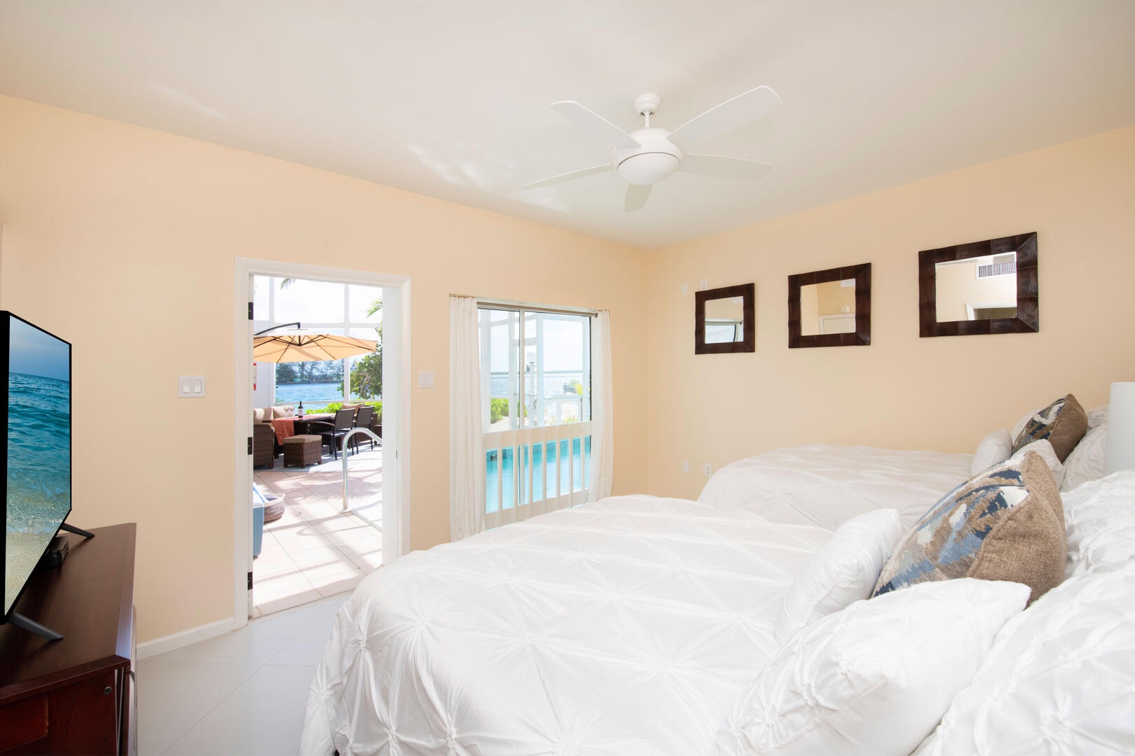 Guest Suite on the lower level with walkout access to the pool deck.